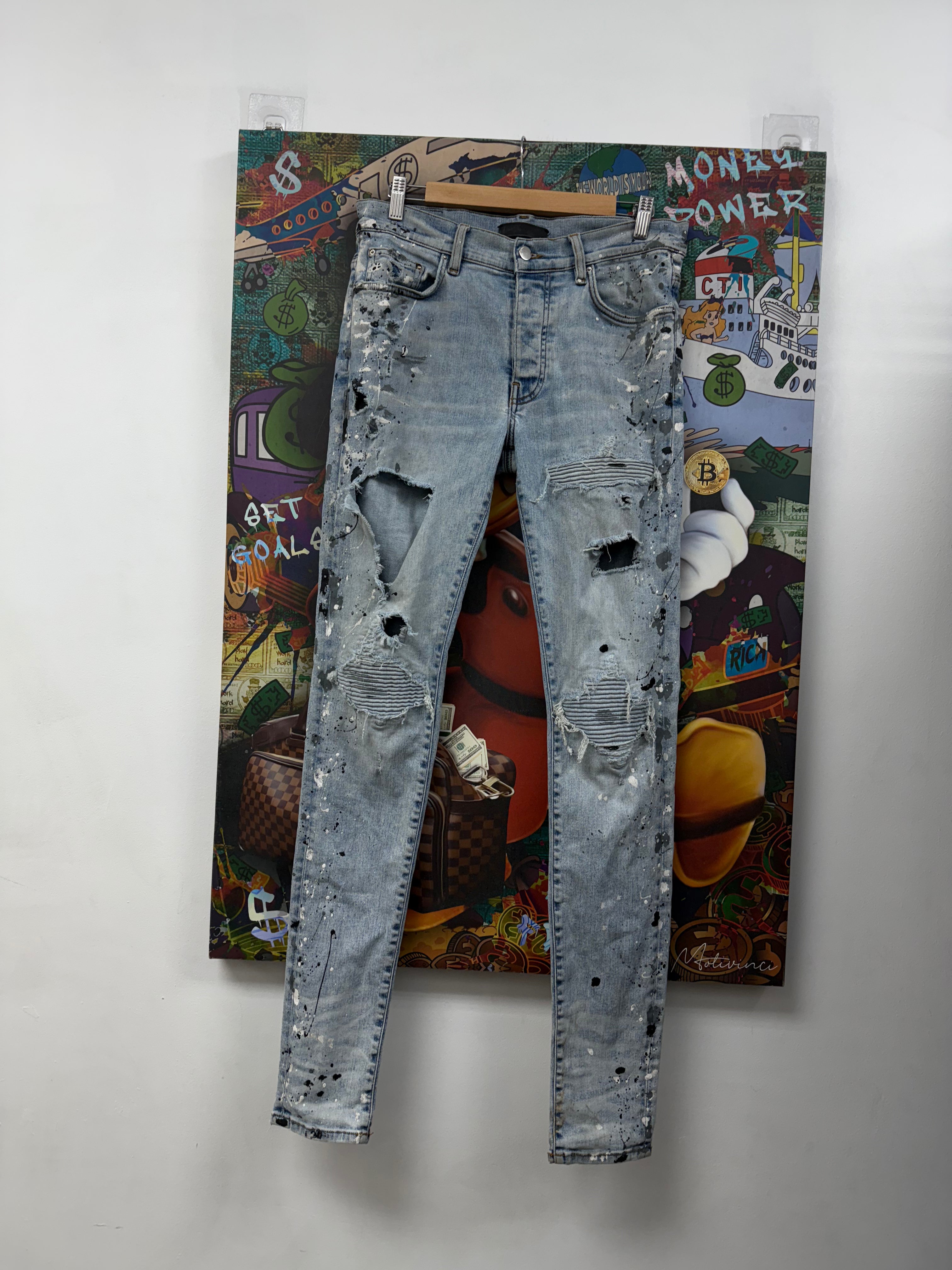 Amiri MX1 Light Wash Denim Paint Splatter Patch Jeans