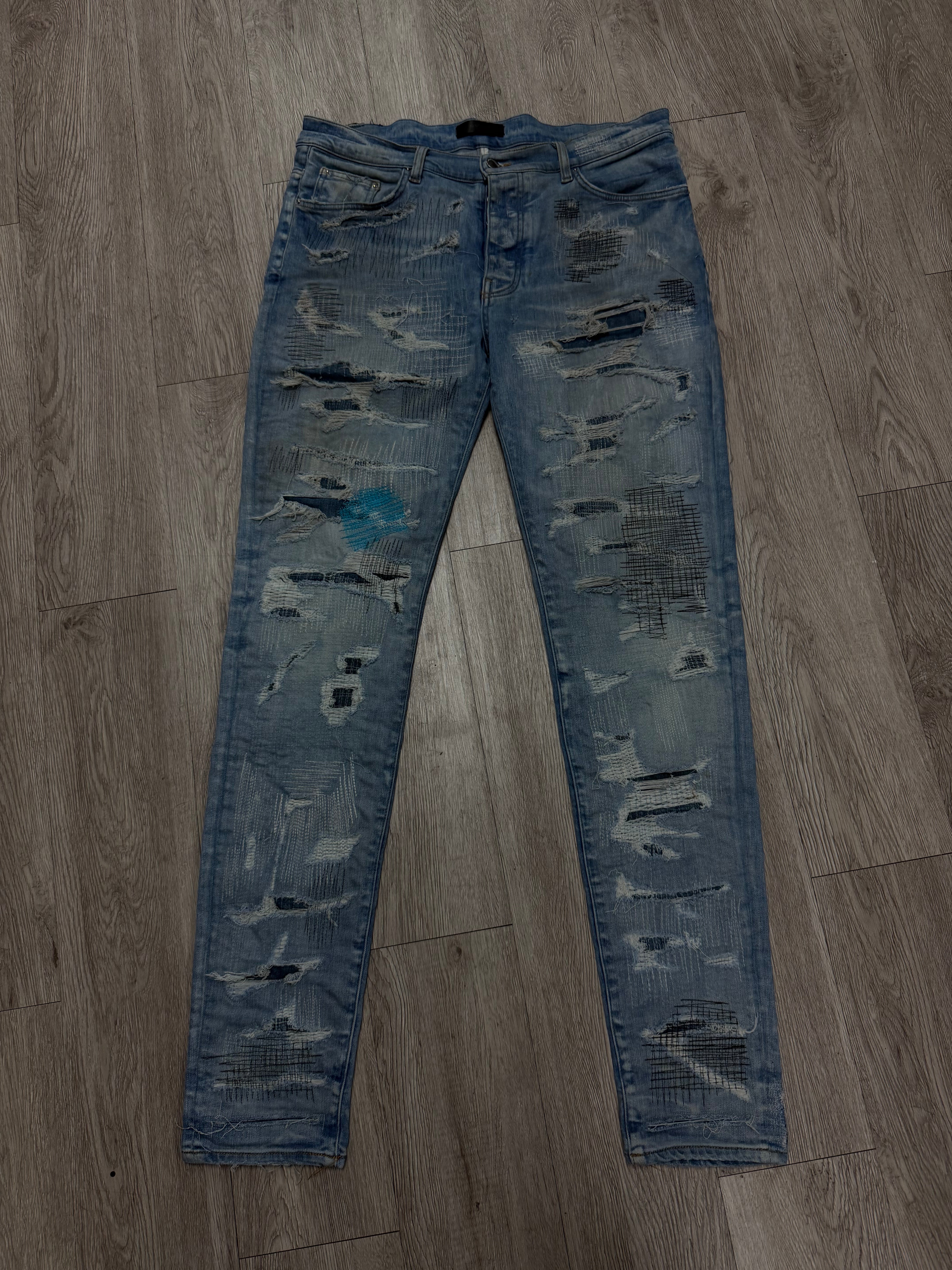 Amiri Light Wash Multi Stitch Jeans