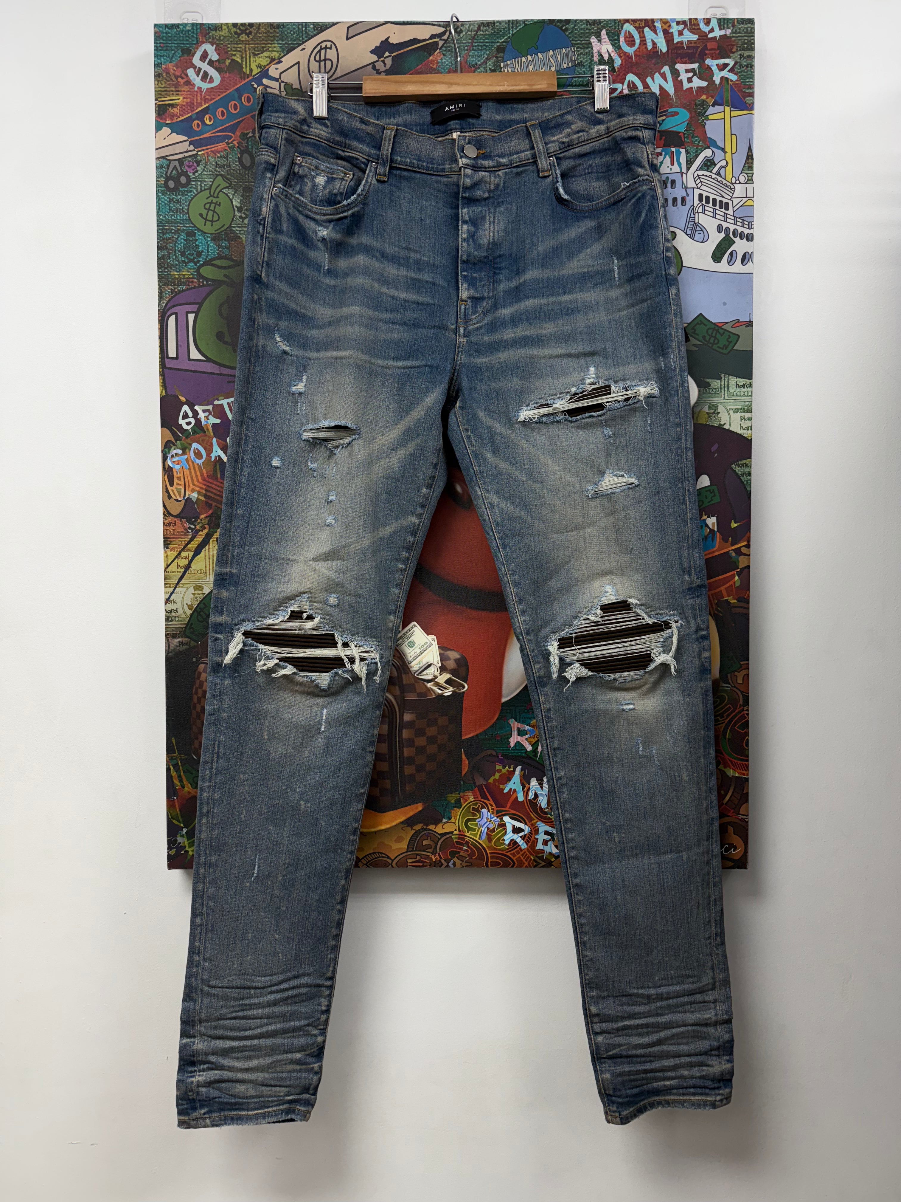 Amiri MX1 Light Wash Brown Ultrasuede Patch Jeans