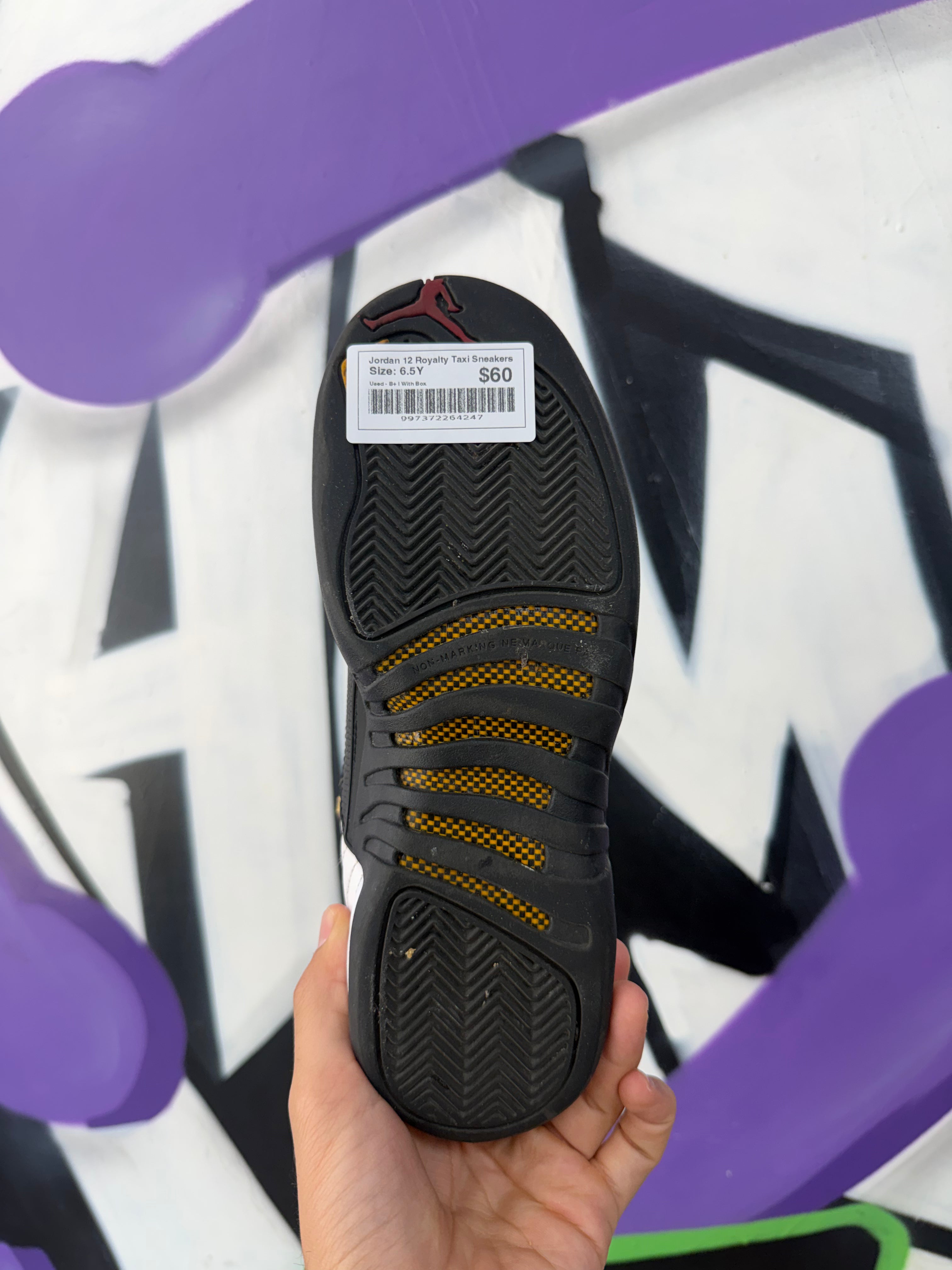 Jordan 12 Royalty Taxi Sneakers