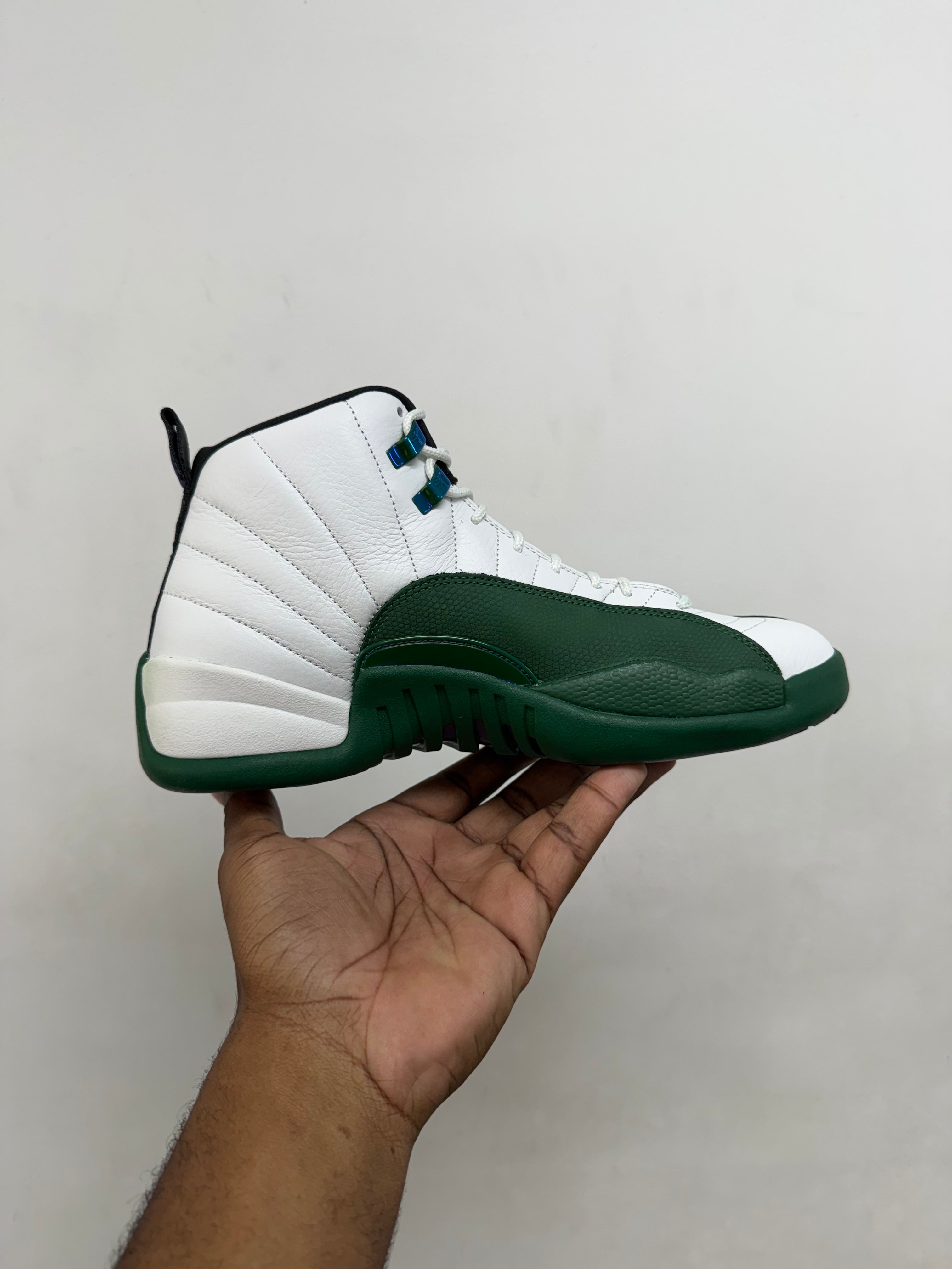 Jordan 12 Buck Green Sneakers
