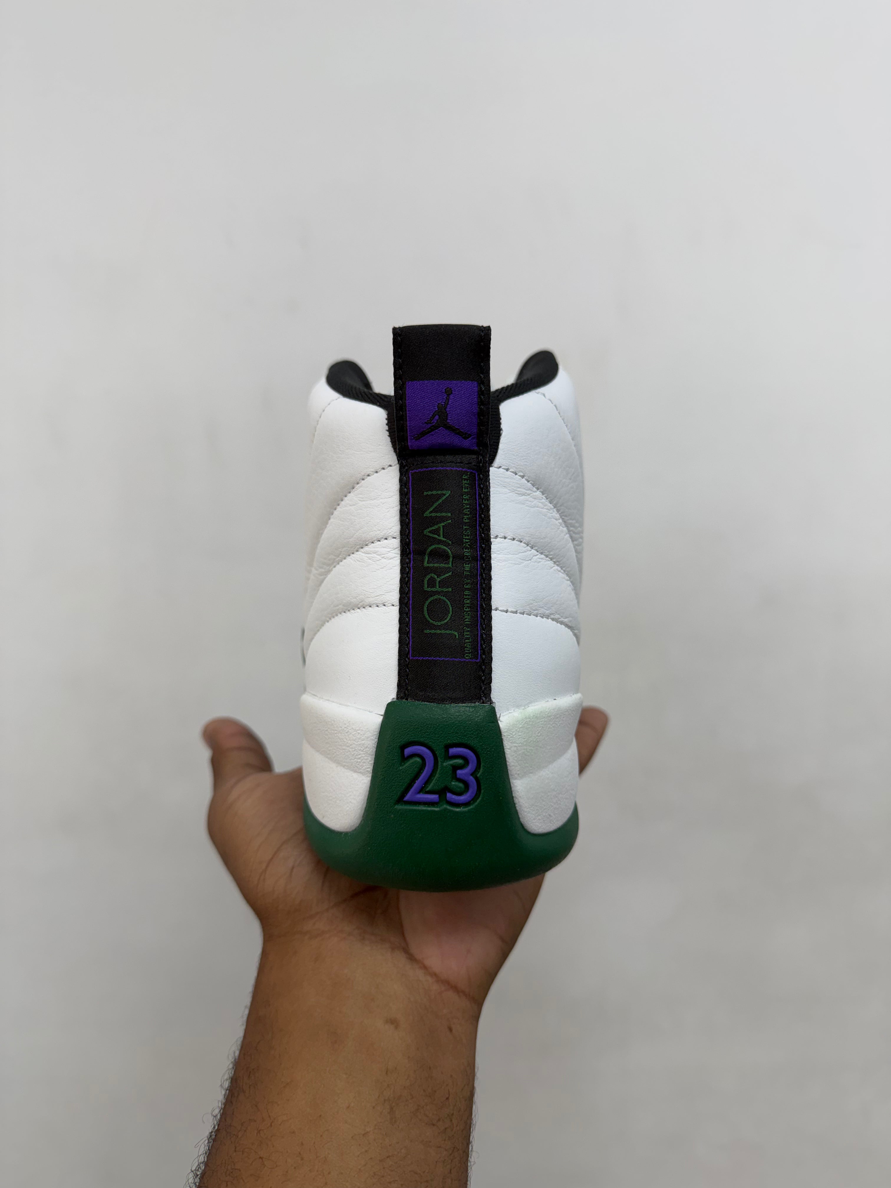 Jordan 12 Buck Green Sneakers