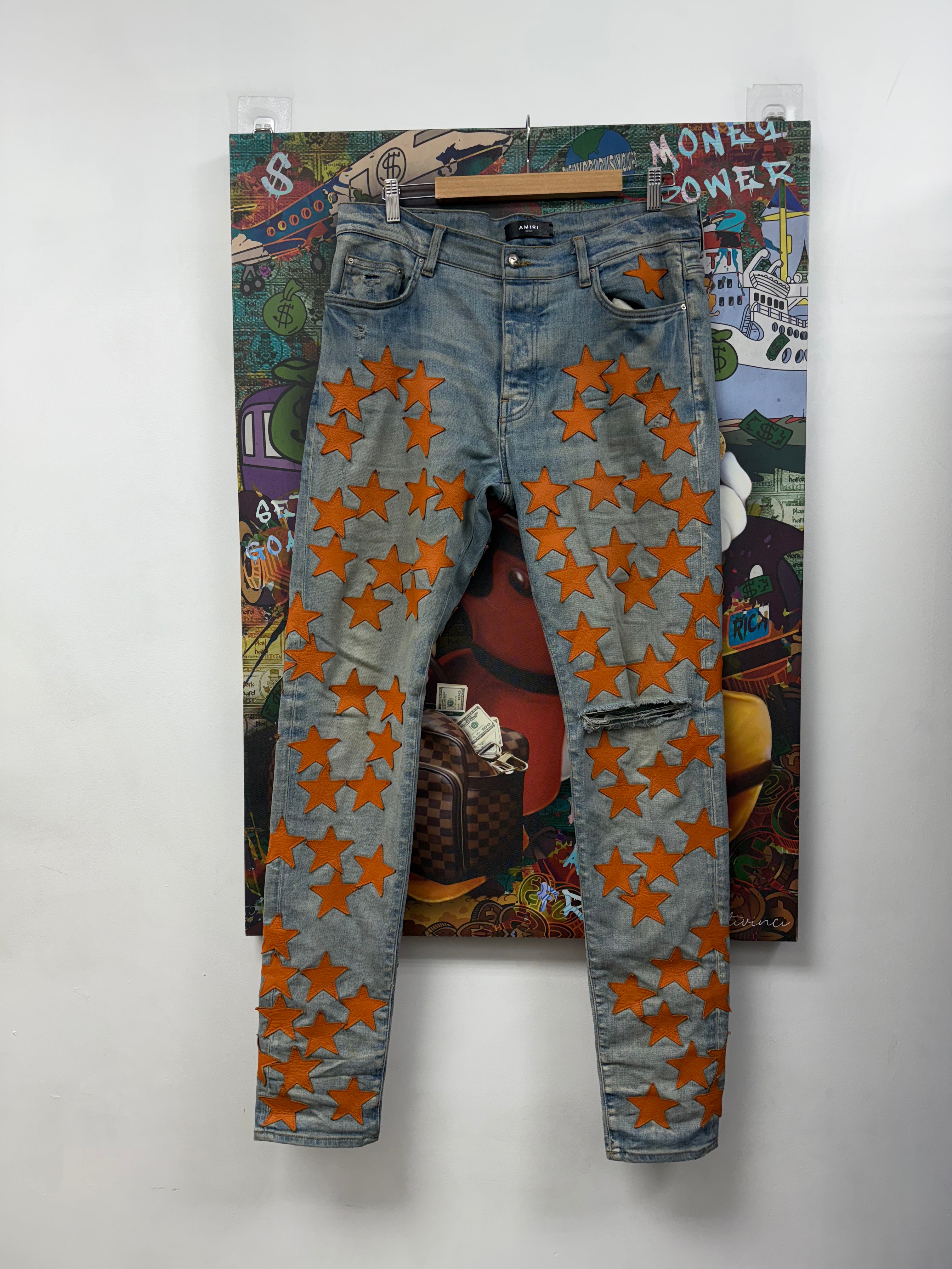Amiri Light Wash Orange Chemist Stars Jeans