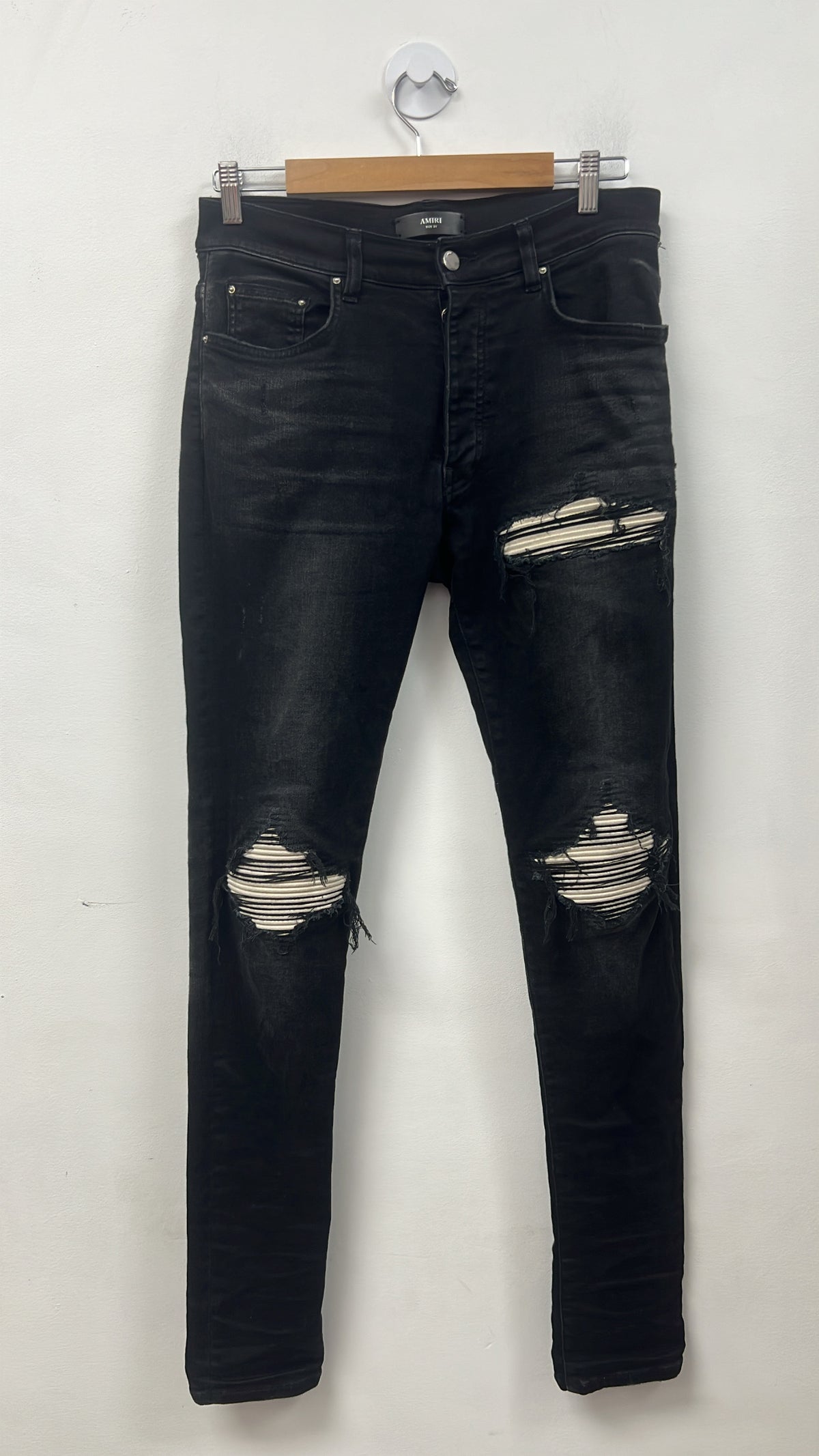 Amiri MX1 Black Wash White Patch Jeans
