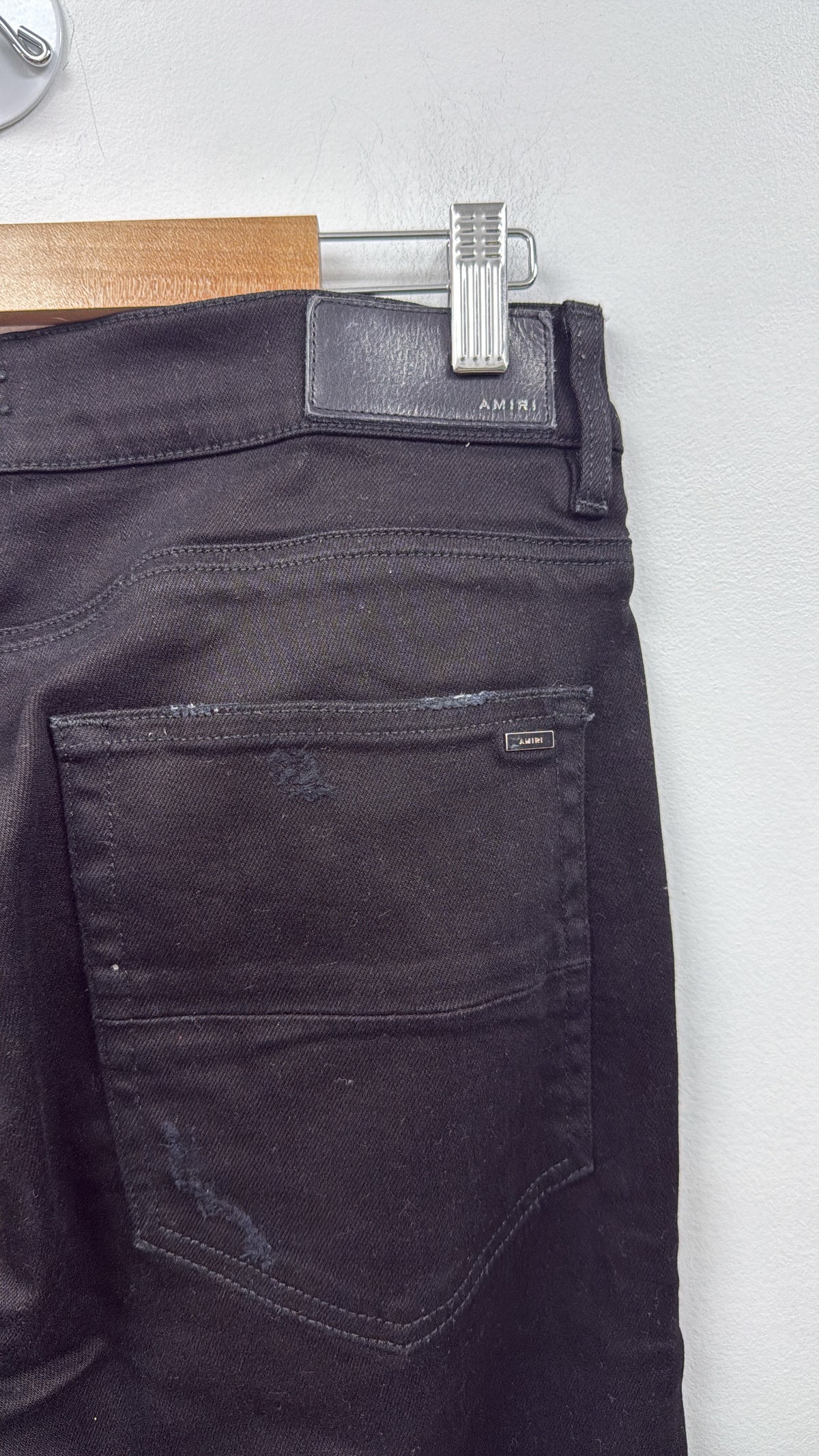 Amiri MX1 Light Wash Black Leather Patch Jeans