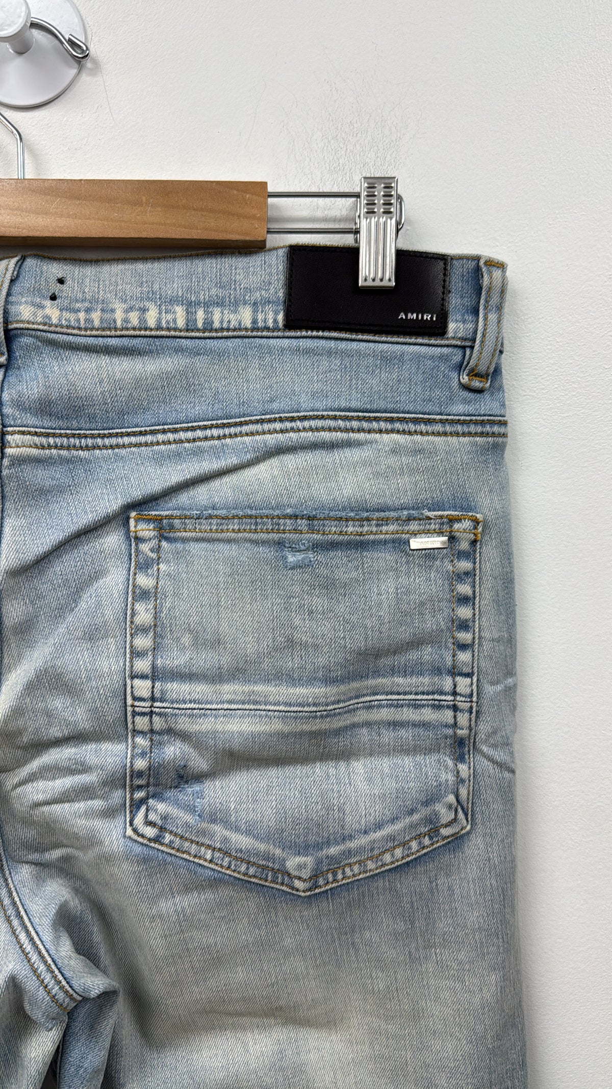 Amiri MX1 Light Wash Camo Patch Jeans