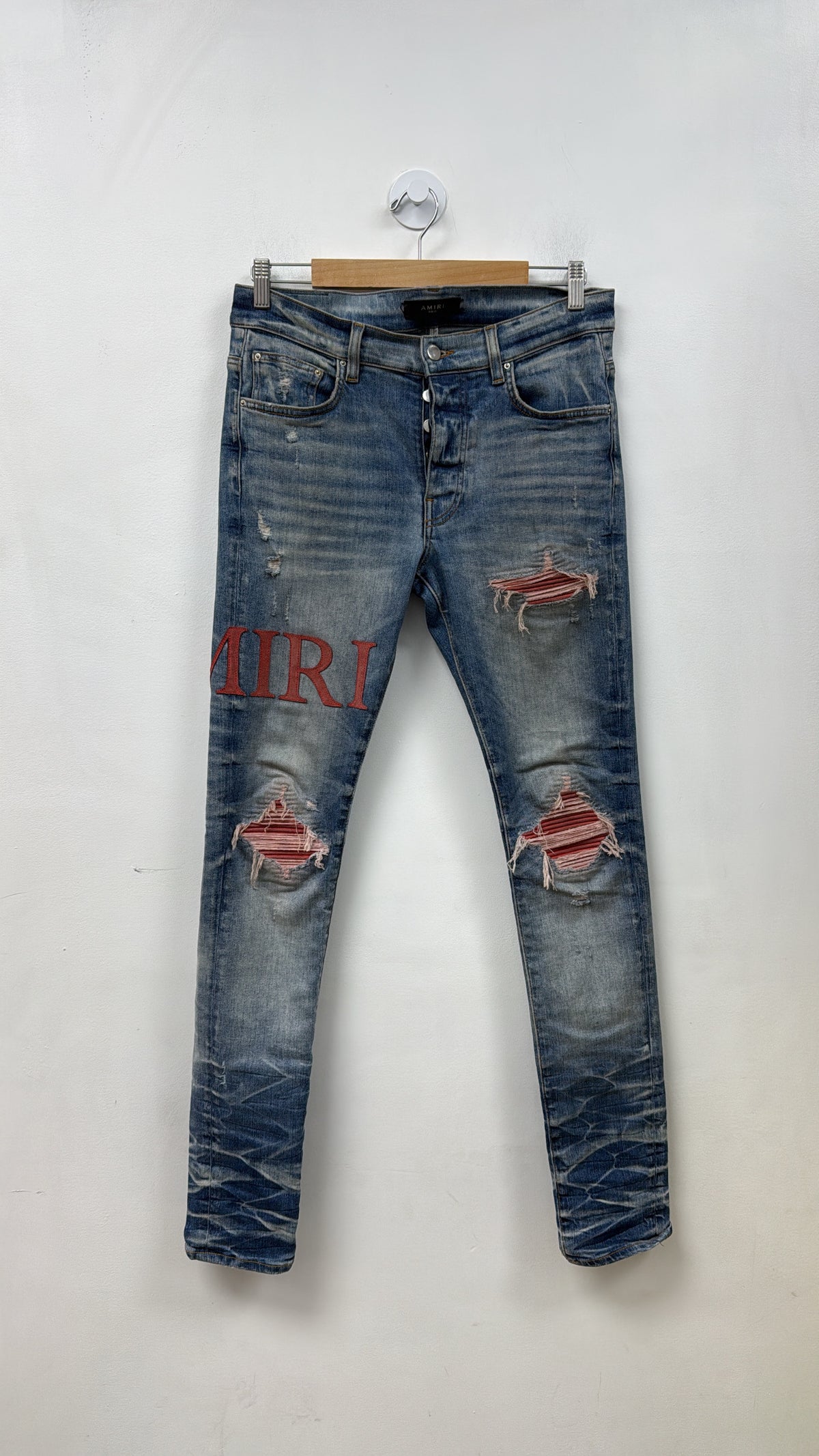 Amiri MX1 Light Wash Side Logo Red Suede Patch Jeans