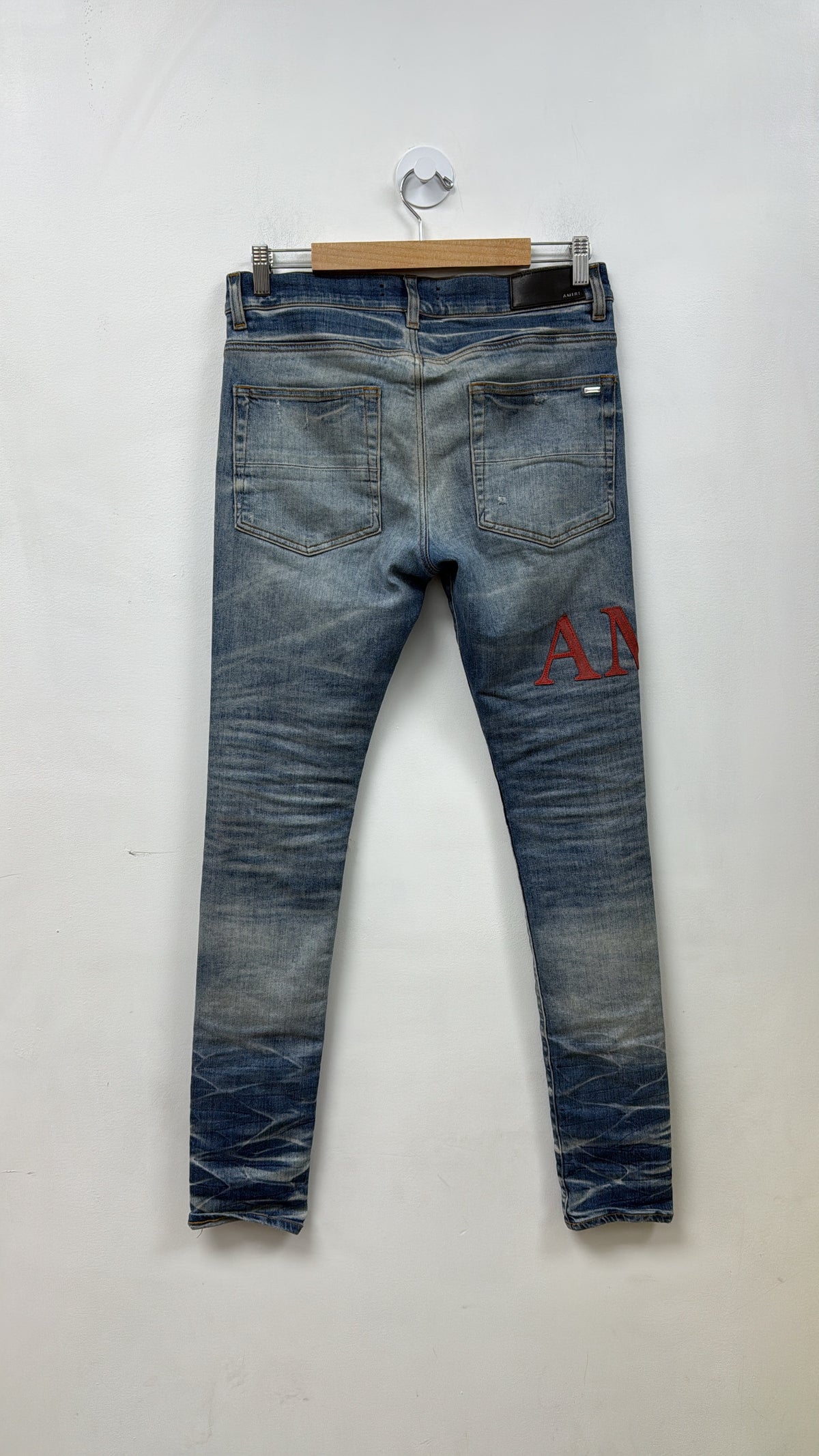 Amiri MX1 Light Wash Side Logo Red Suede Patch Jeans