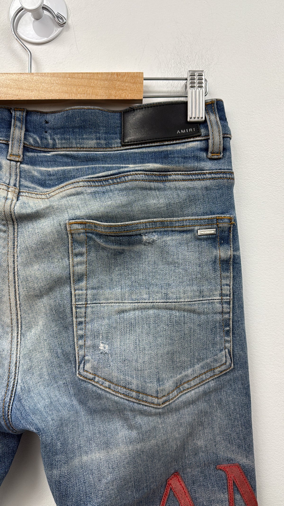 Amiri MX1 Light Wash Side Logo Red Suede Patch Jeans