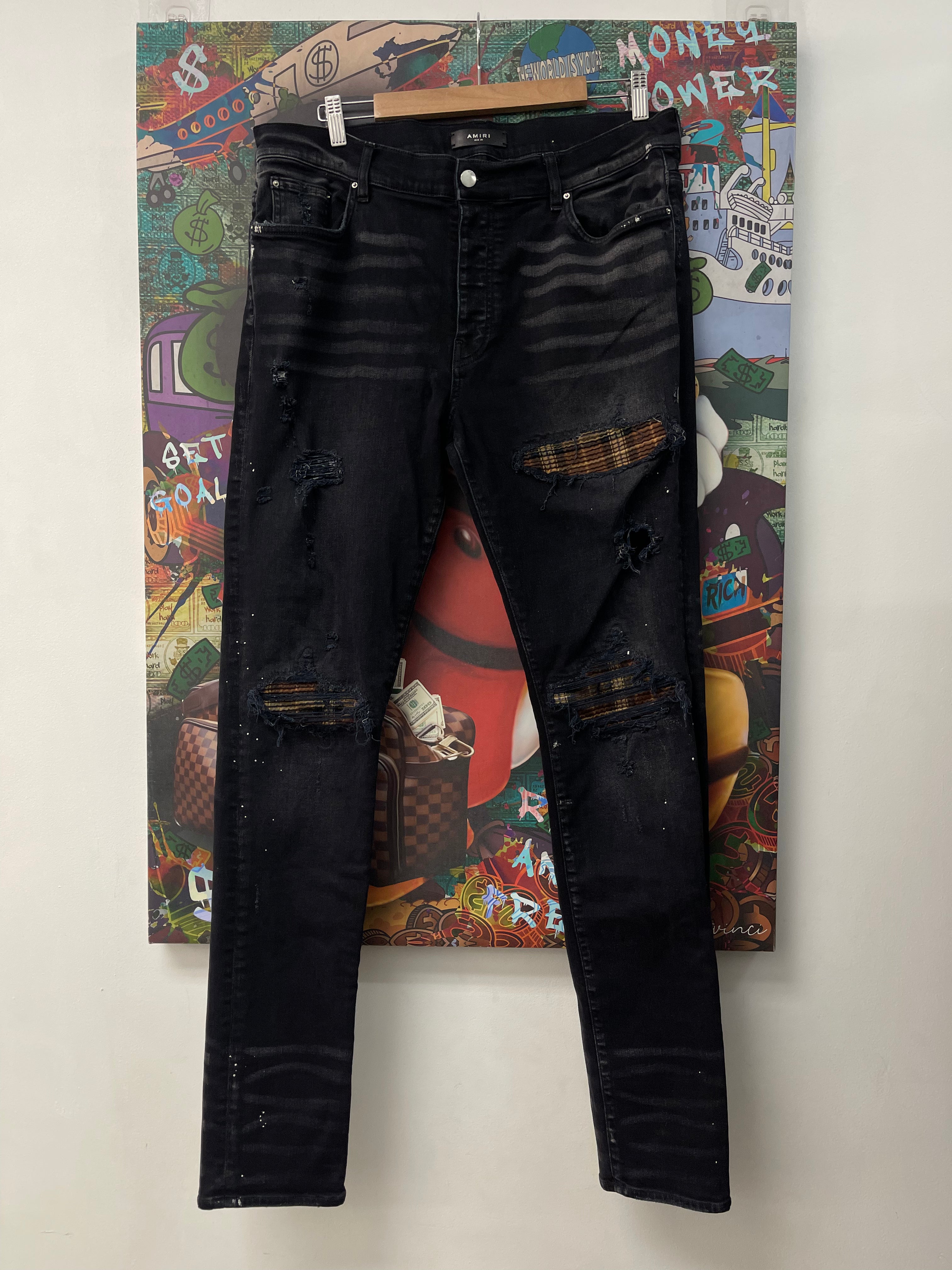 Amiri Black Wash Brown Paisley Patch MX1 Jeans
