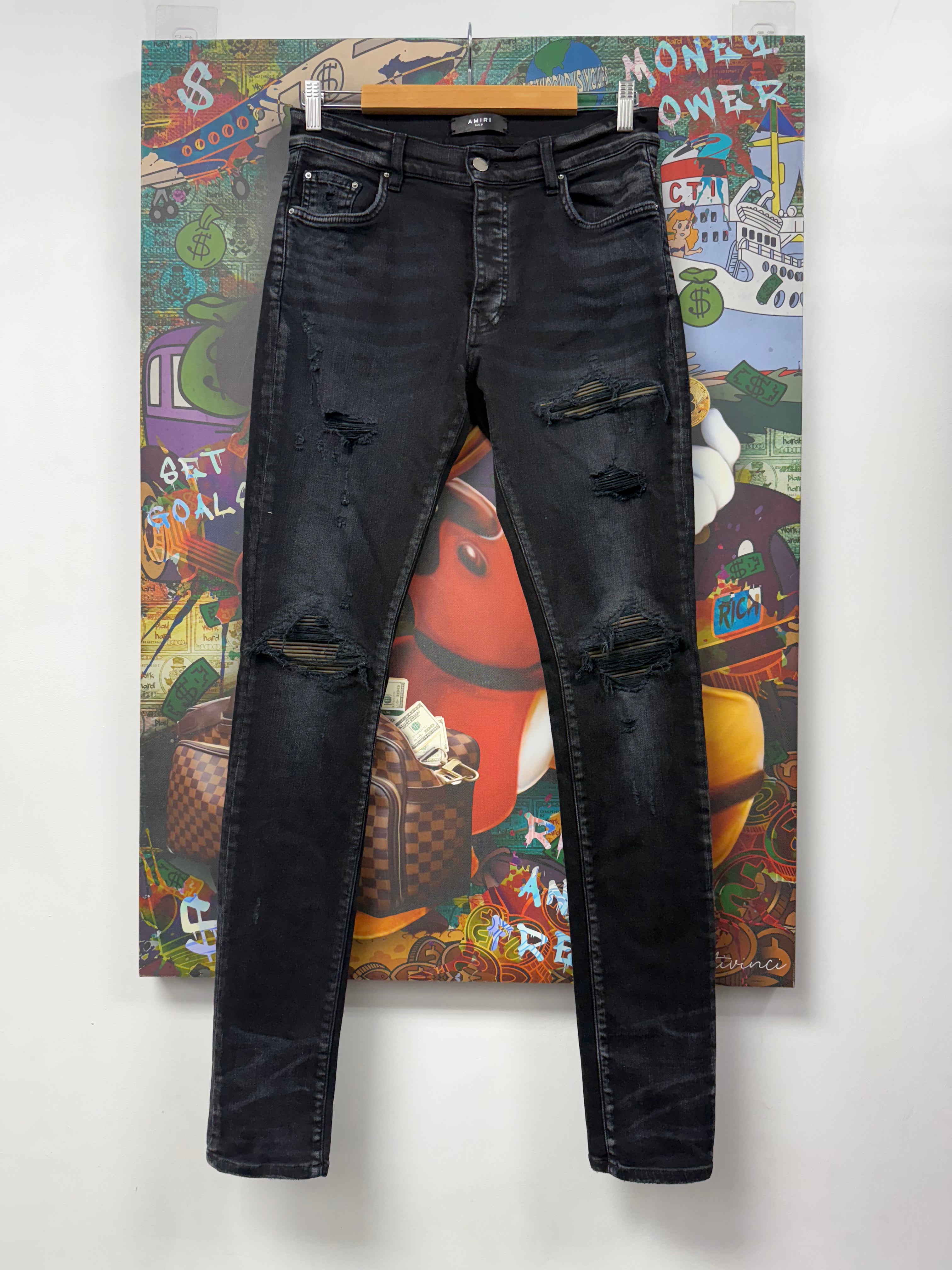 Amiri MX1 Black Wash Camo Patch Jeans