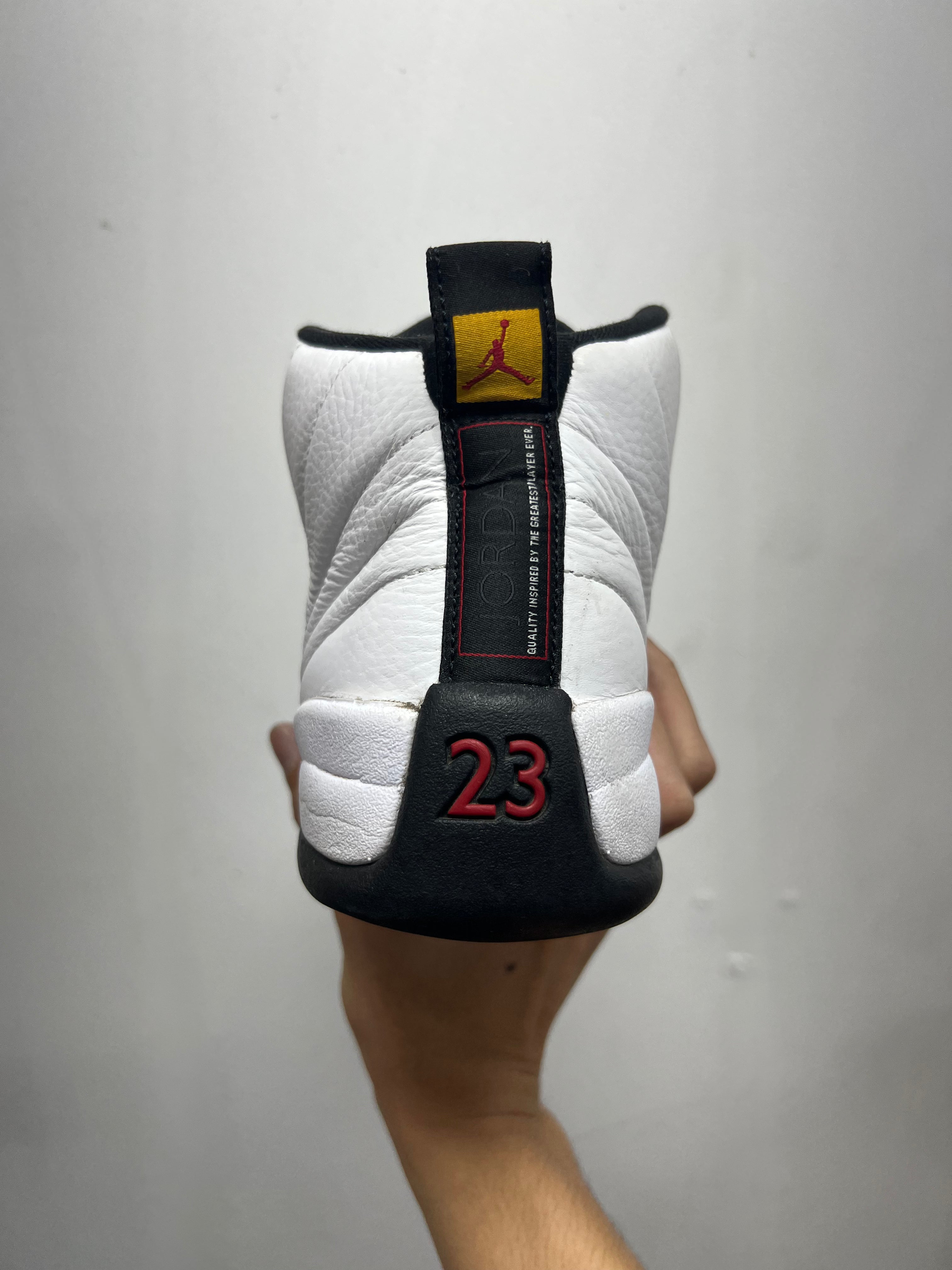Jordan 12 Taxi (Stained Laces) Sneakers
