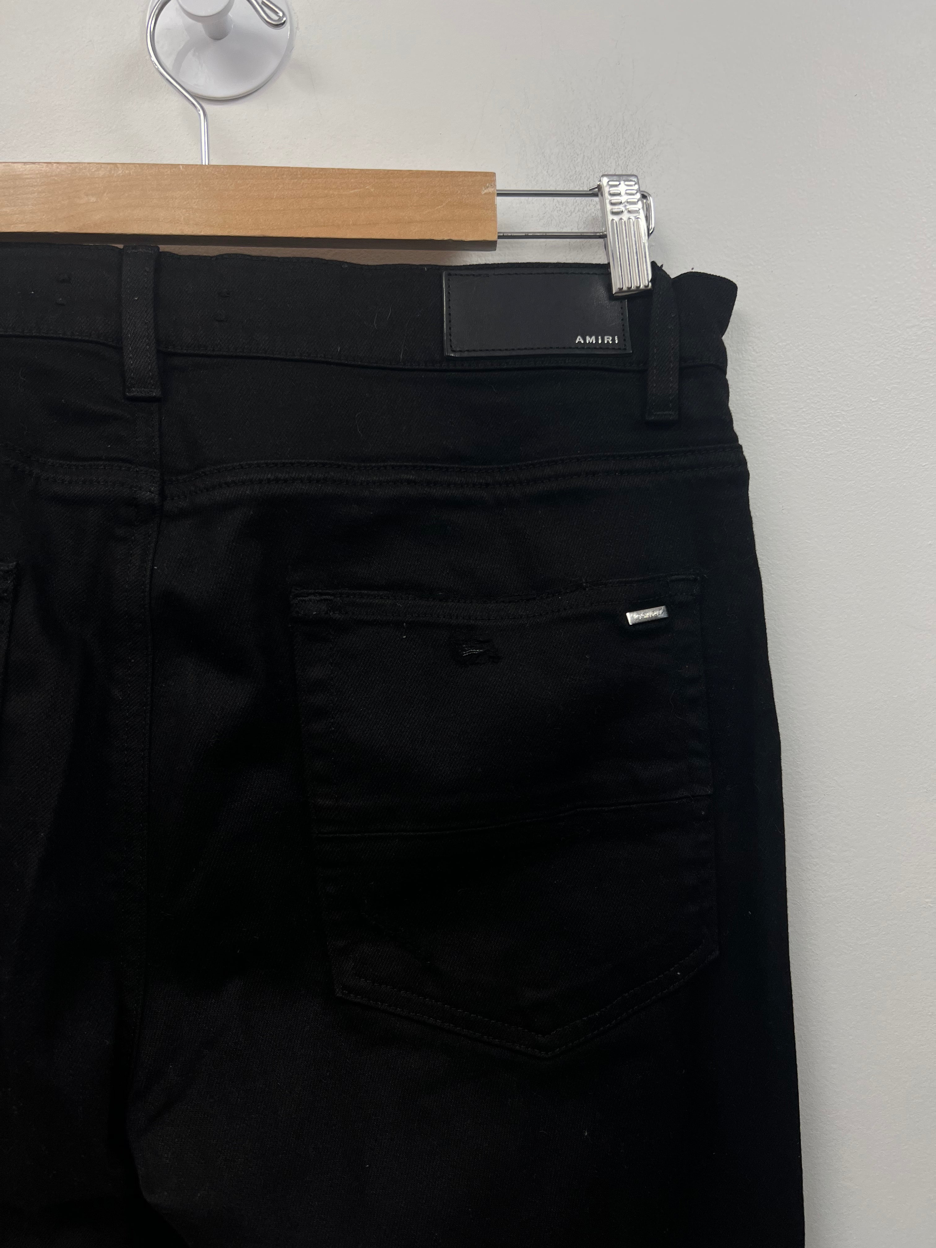 Amiri Black Ripped Thrasher Jeans