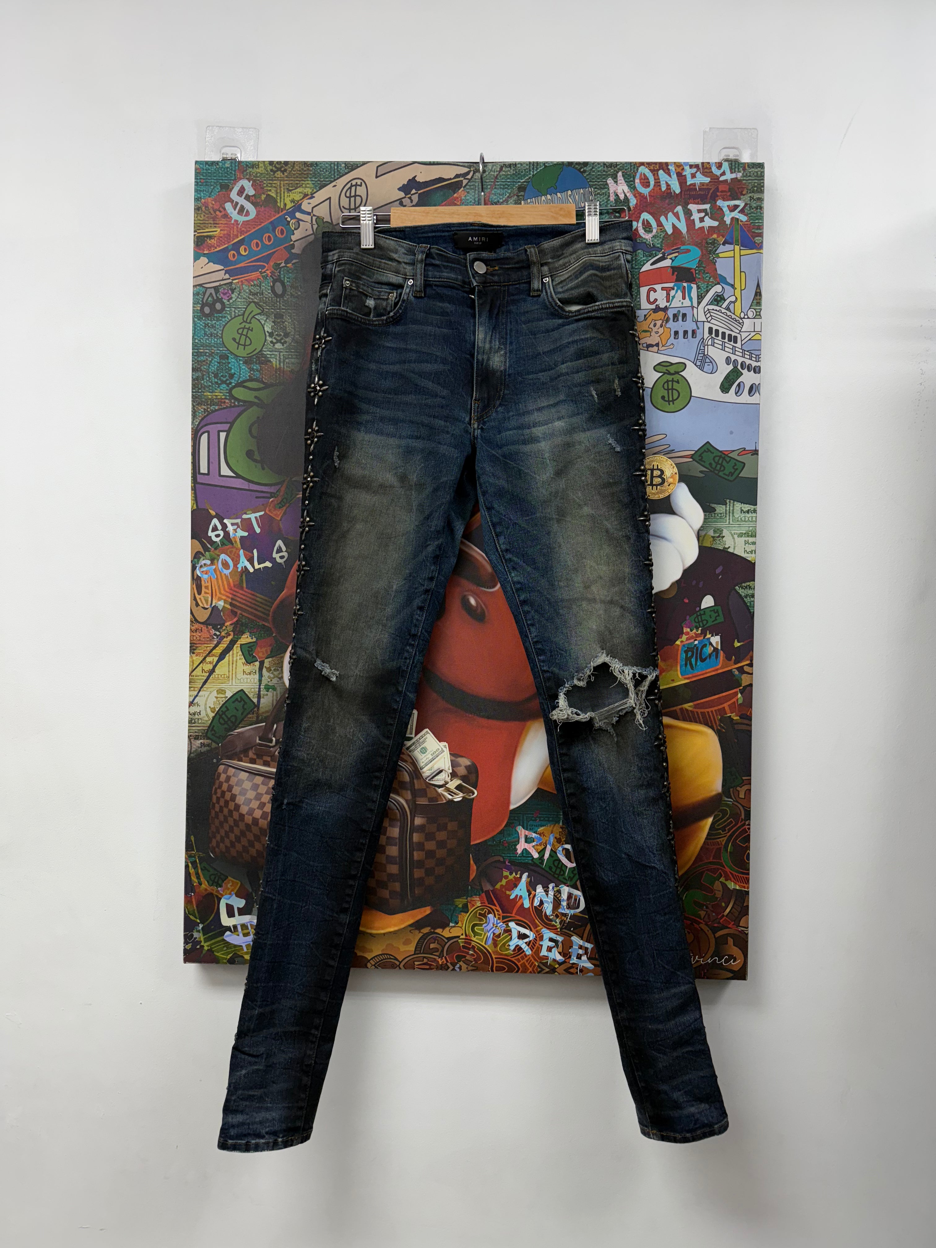 Amiri Rust Indigo Studded Thrasher Jeans