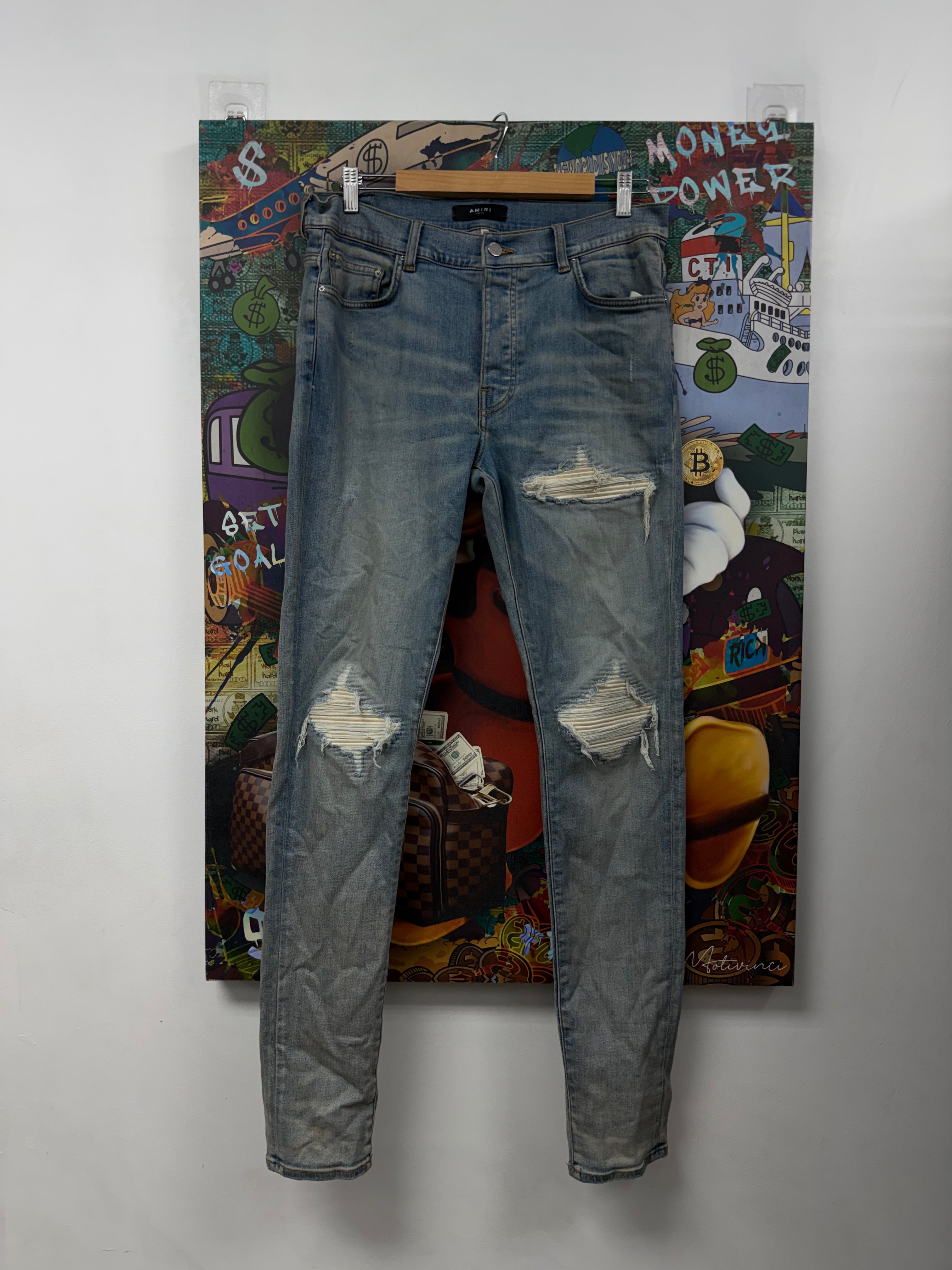 Amiri MX1 Light Wash White Suede Patch Jeans