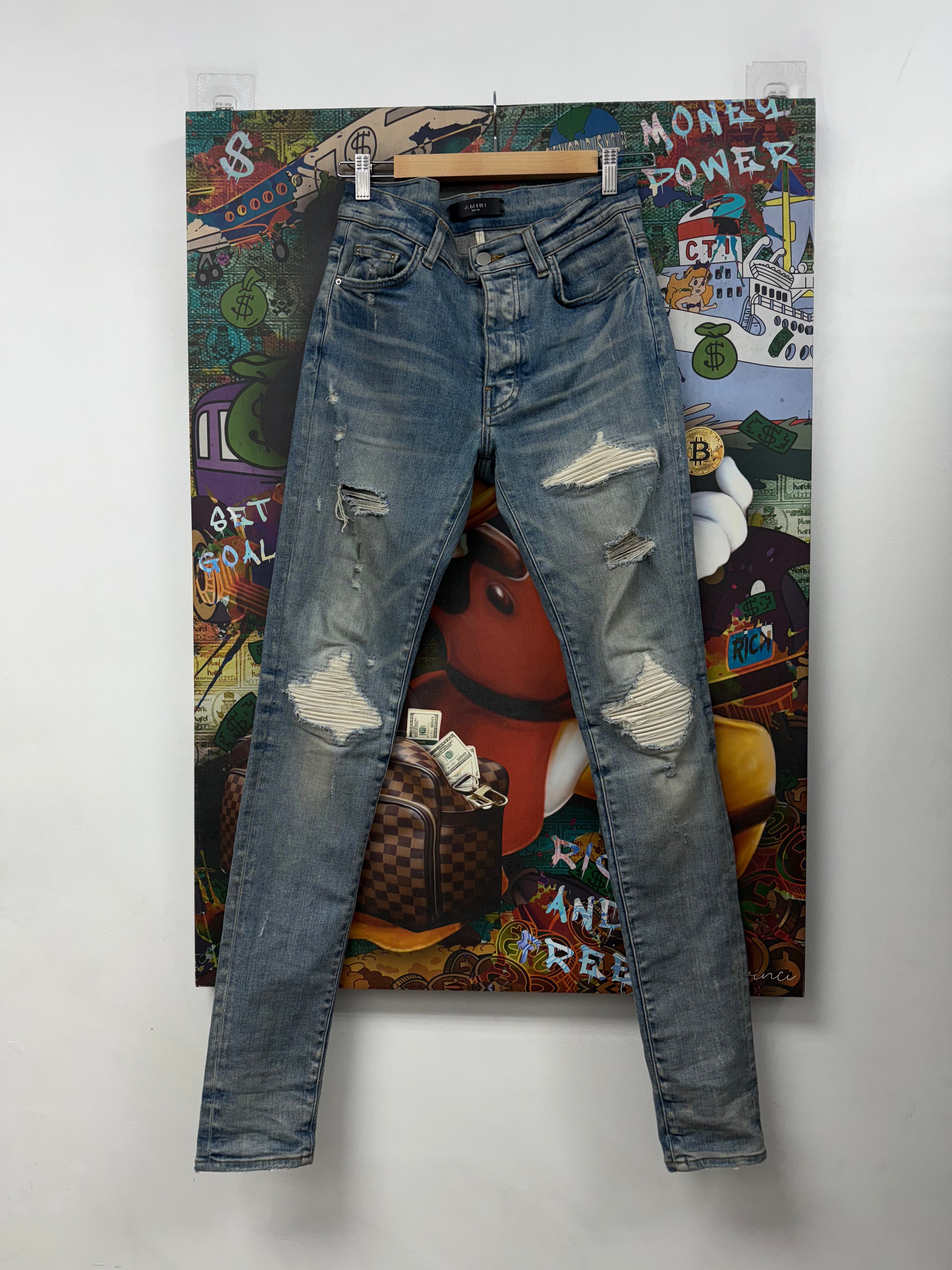 Amiri MX1 Light Wash White Patch Jeans