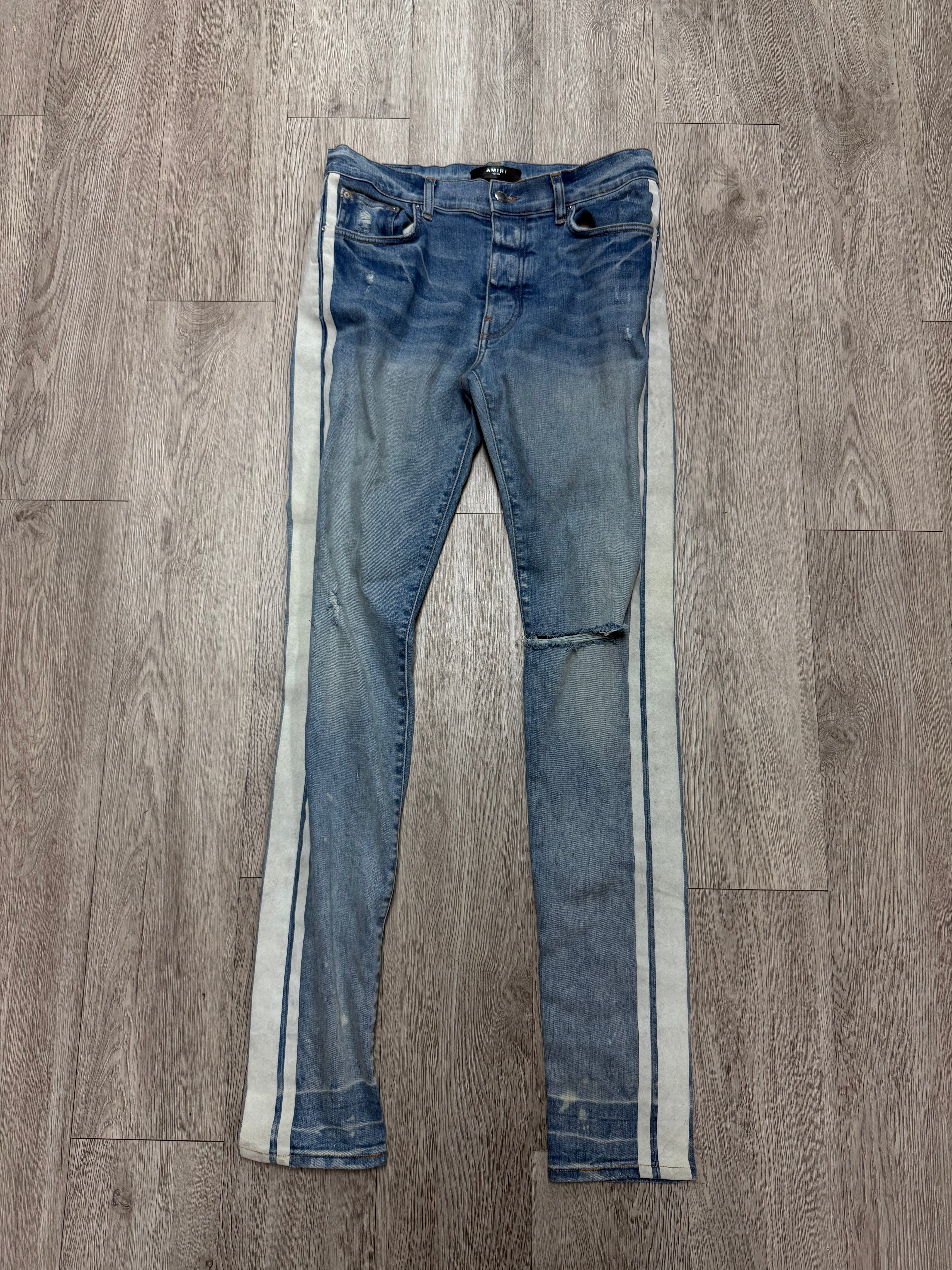 Amiri Light Wash White Stripe Jeans