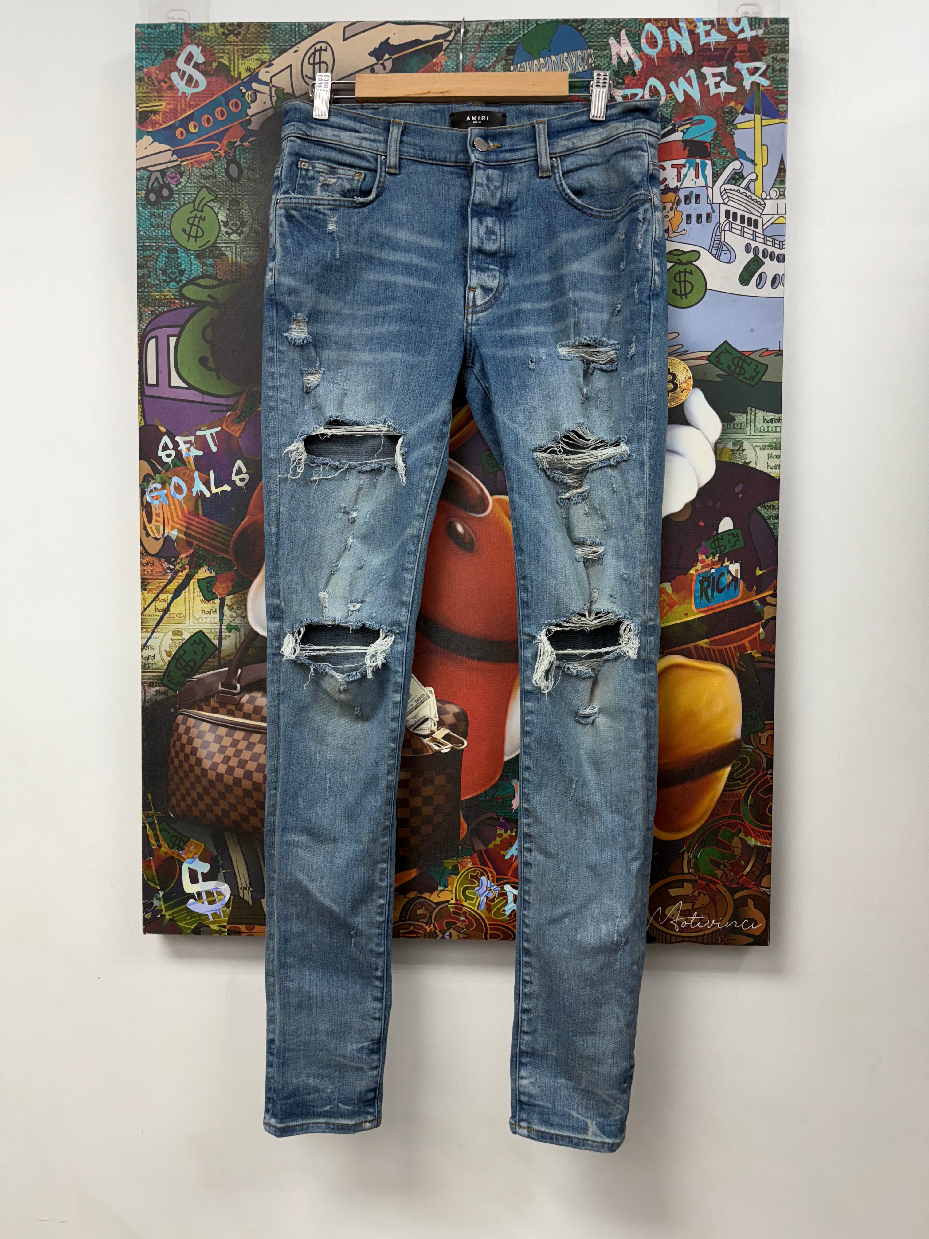 Amiri Light Wash Ripped Jeans