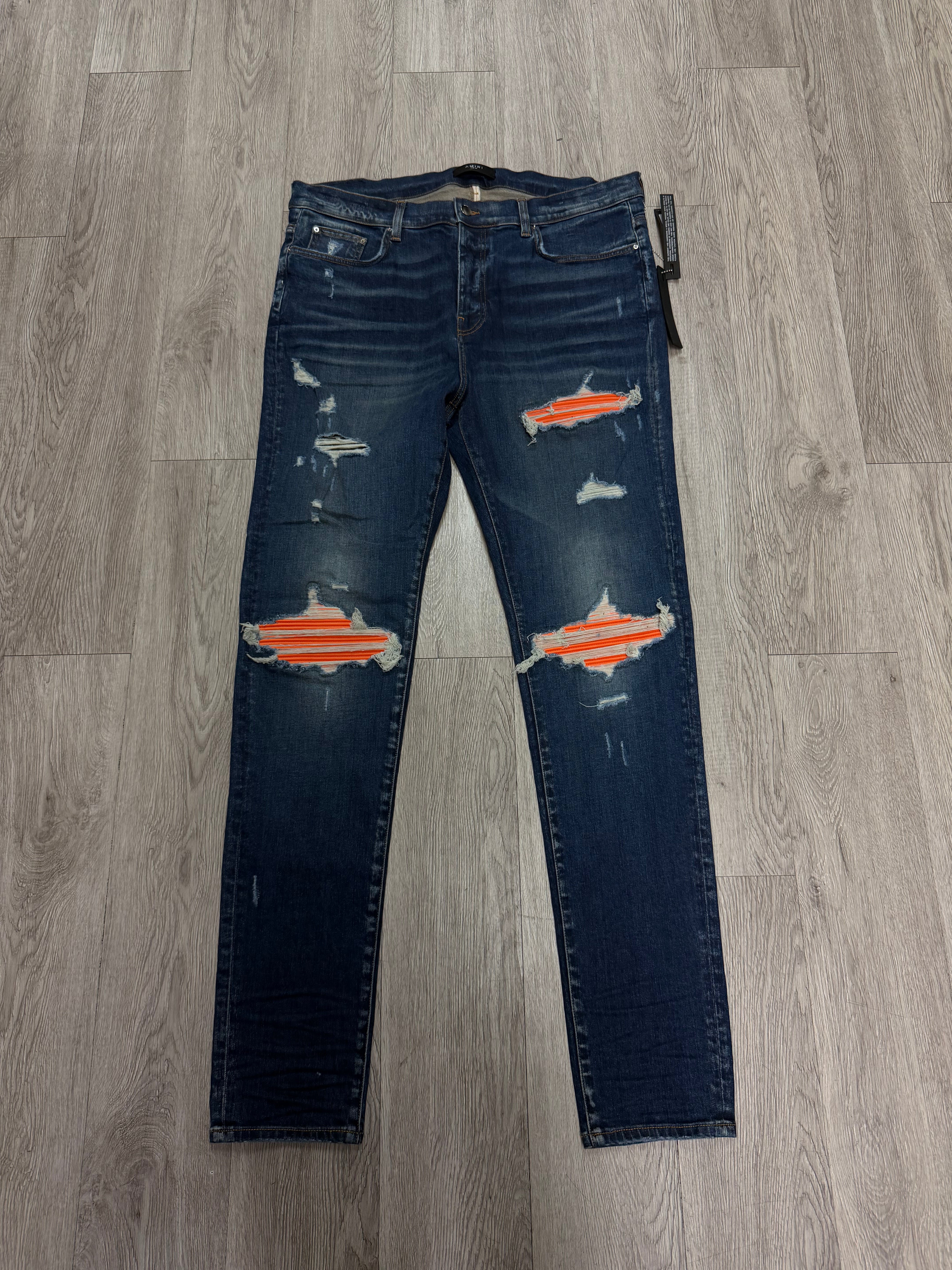 Amiri MX1 Deep Classic Orange Suede Patch Jeans
