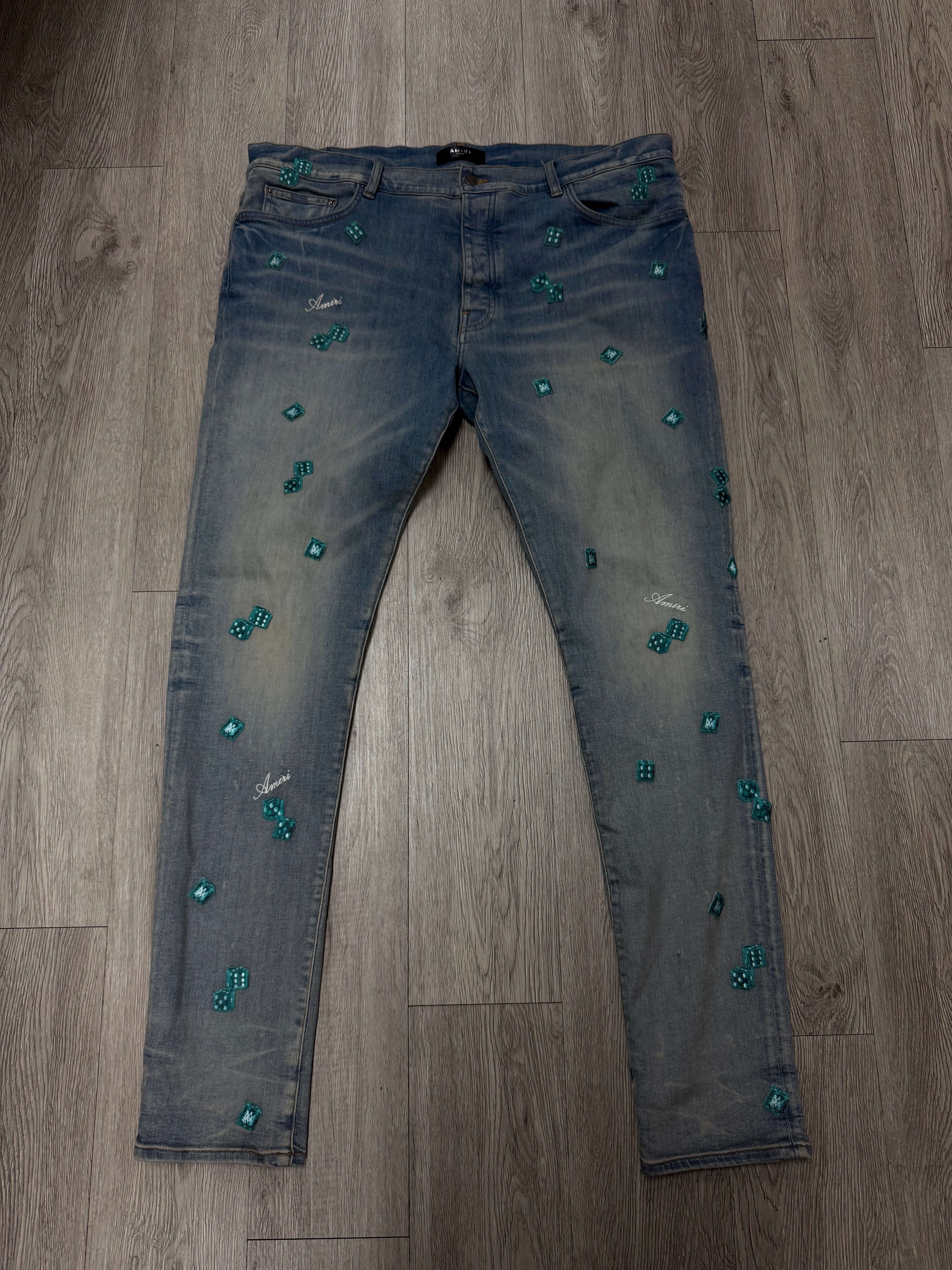Amiri Light Wash Dice Thrasher Jeans