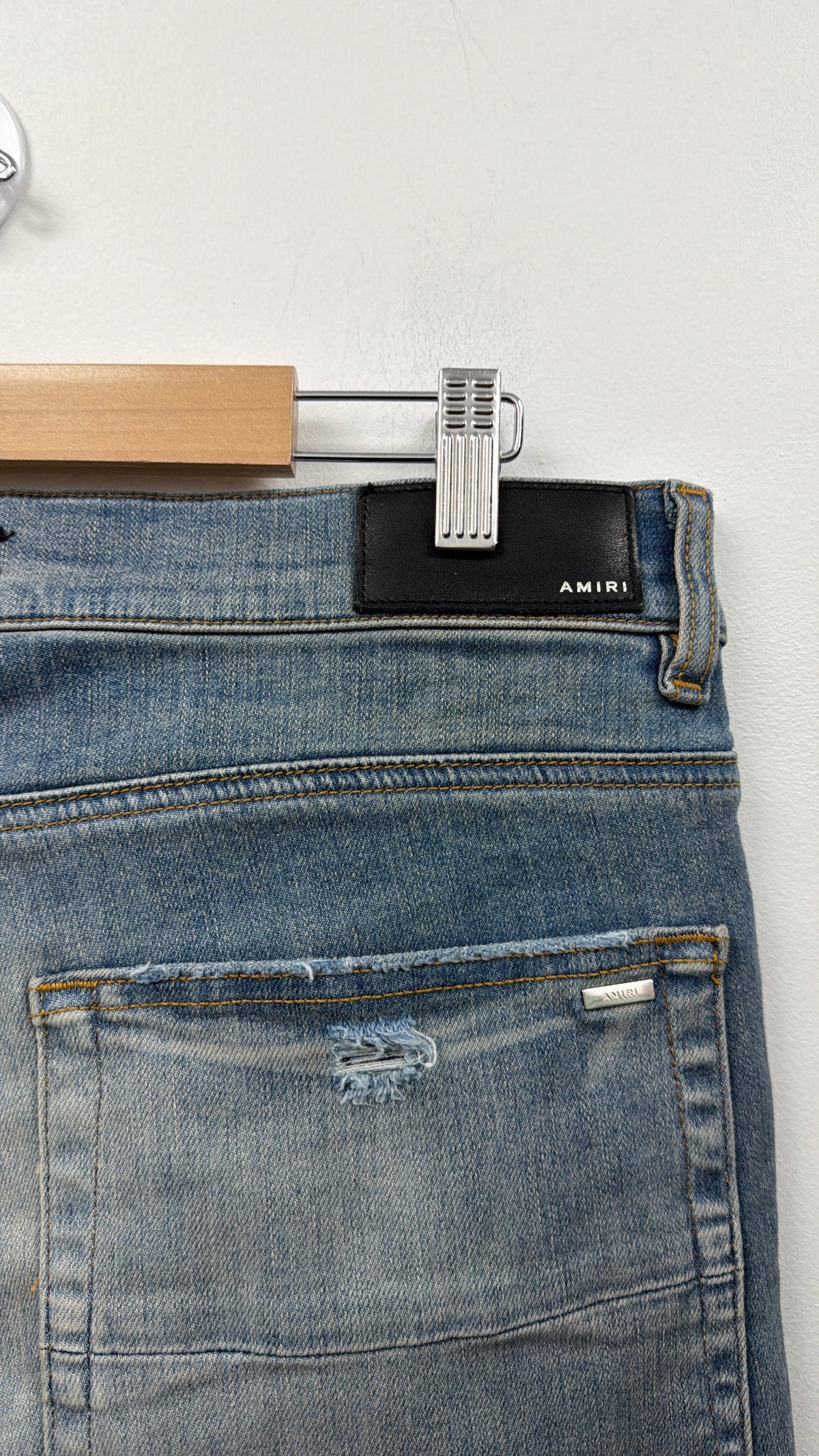 Amiri MX1 Light Wash Black Leather Patch Jeans