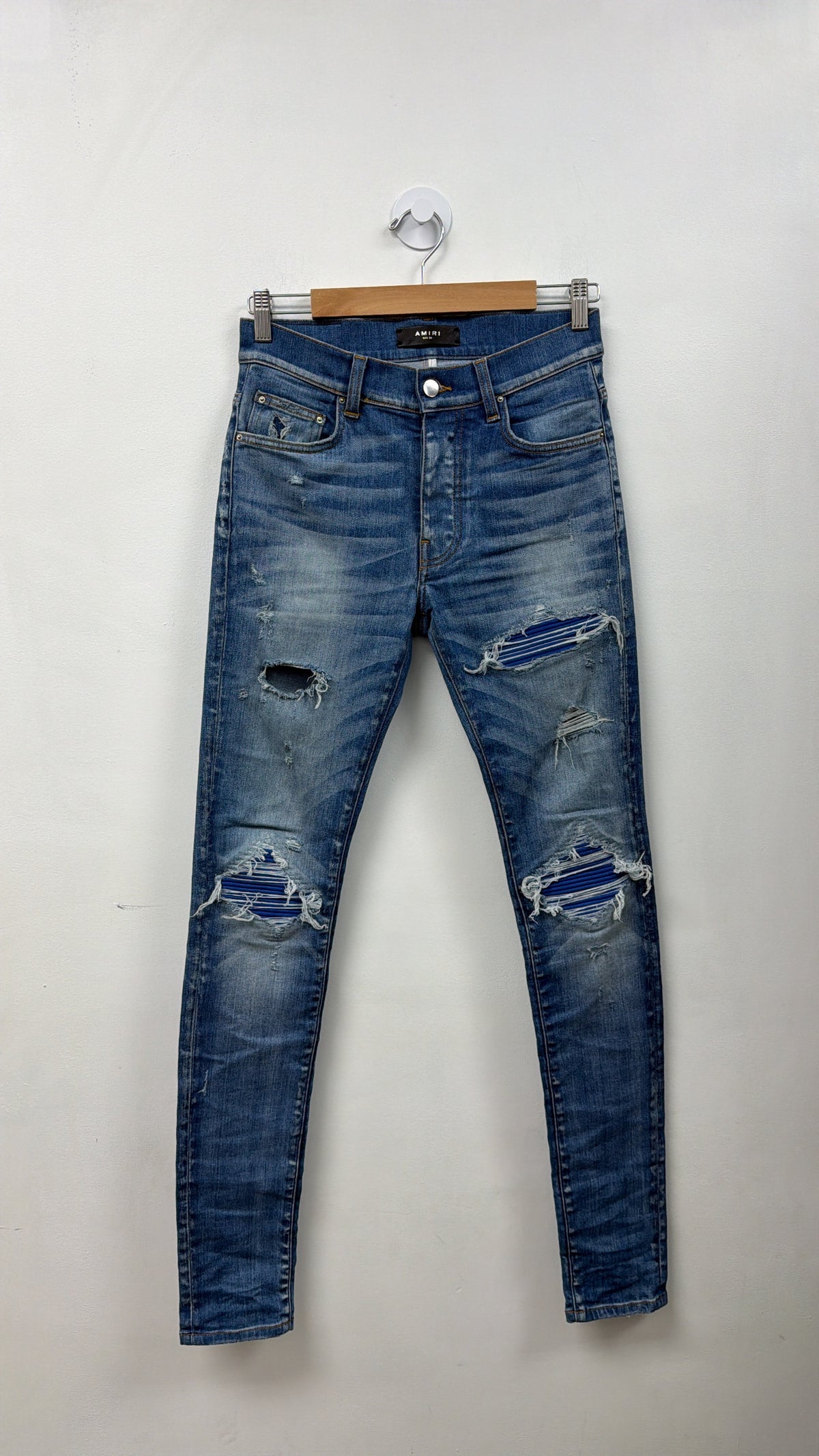 Amiri MX1 Light Wash Blue Suede Patch Jeans