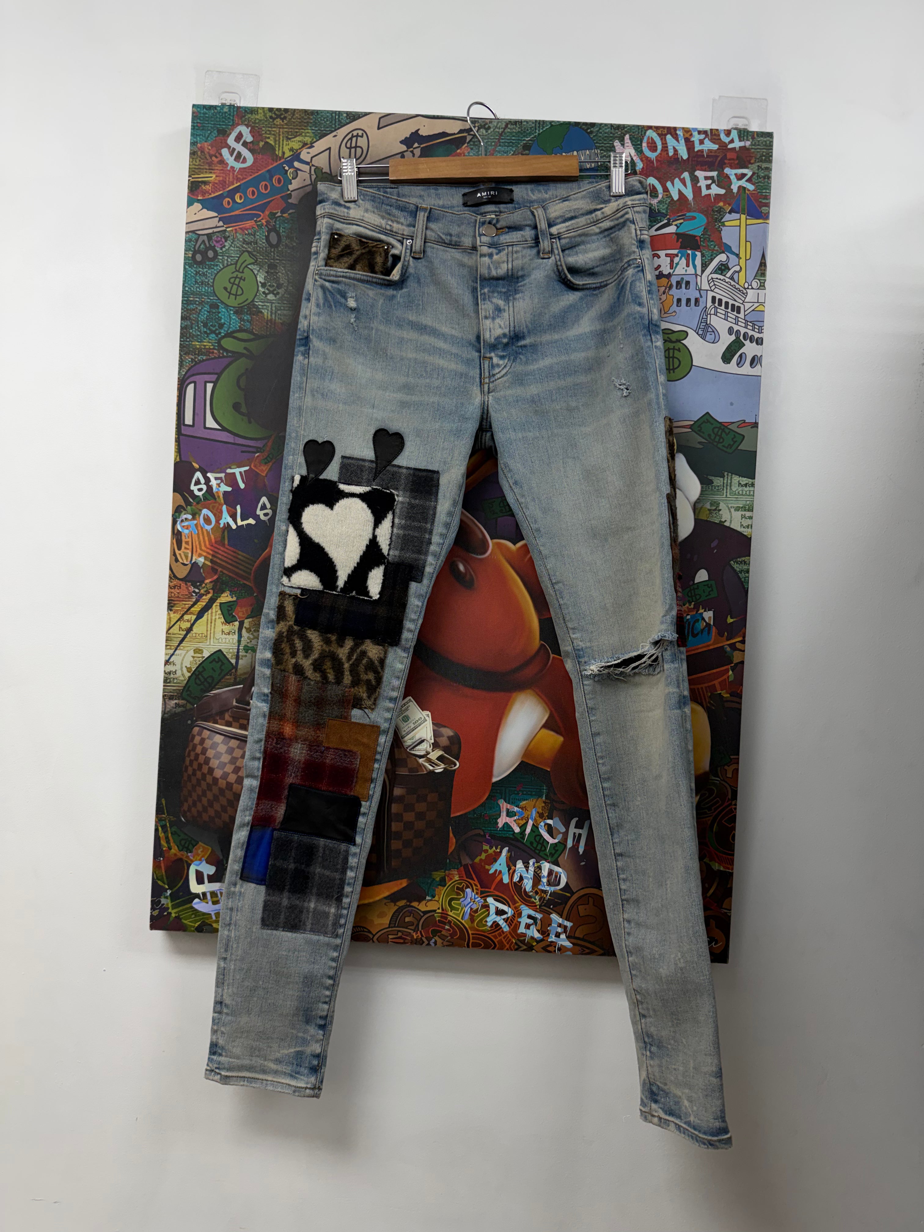 Amiri Light Wash Grunge Patchwork Jeans