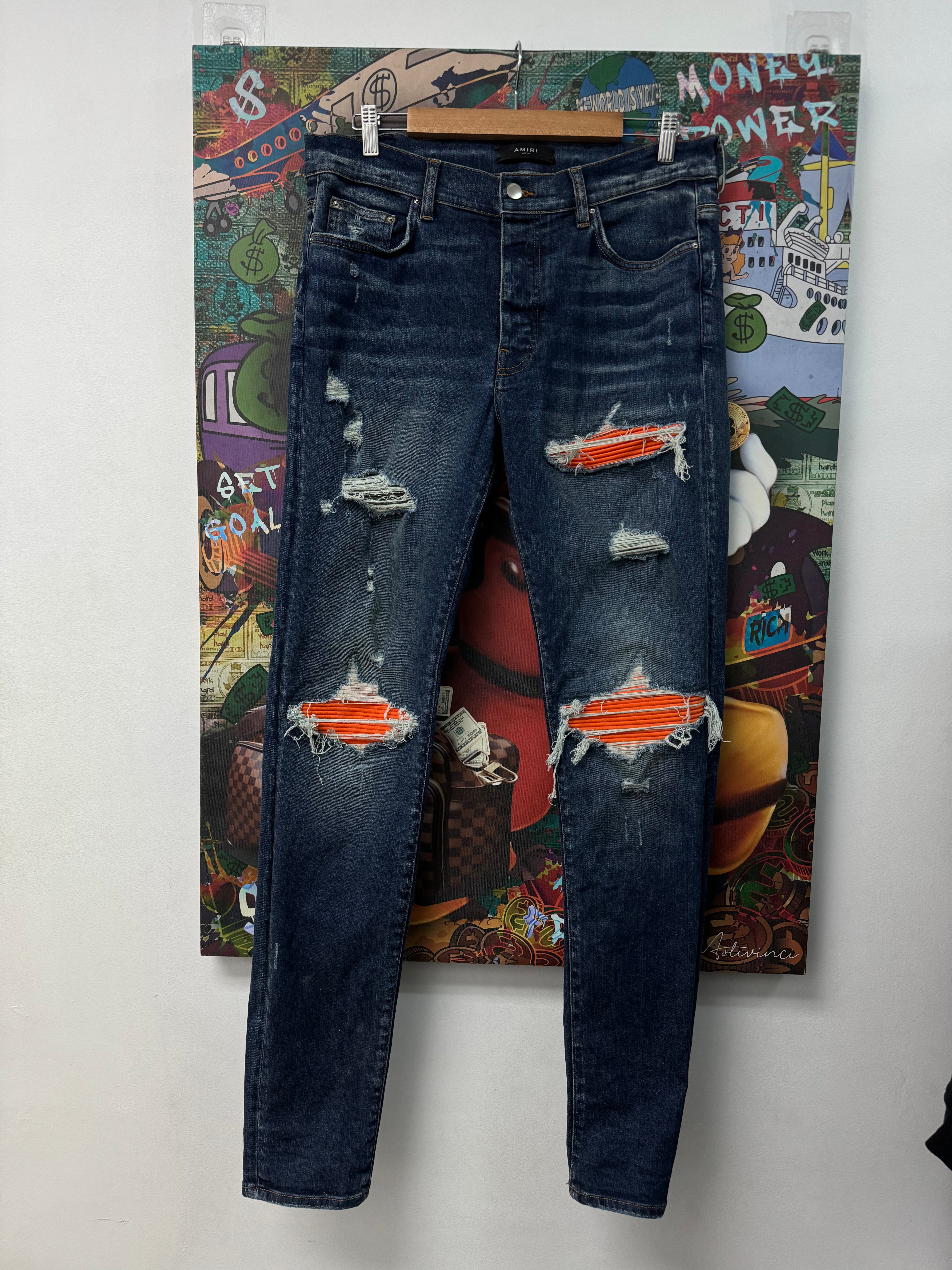 Amiri MX1 Light Wash Orange Patch Jeans