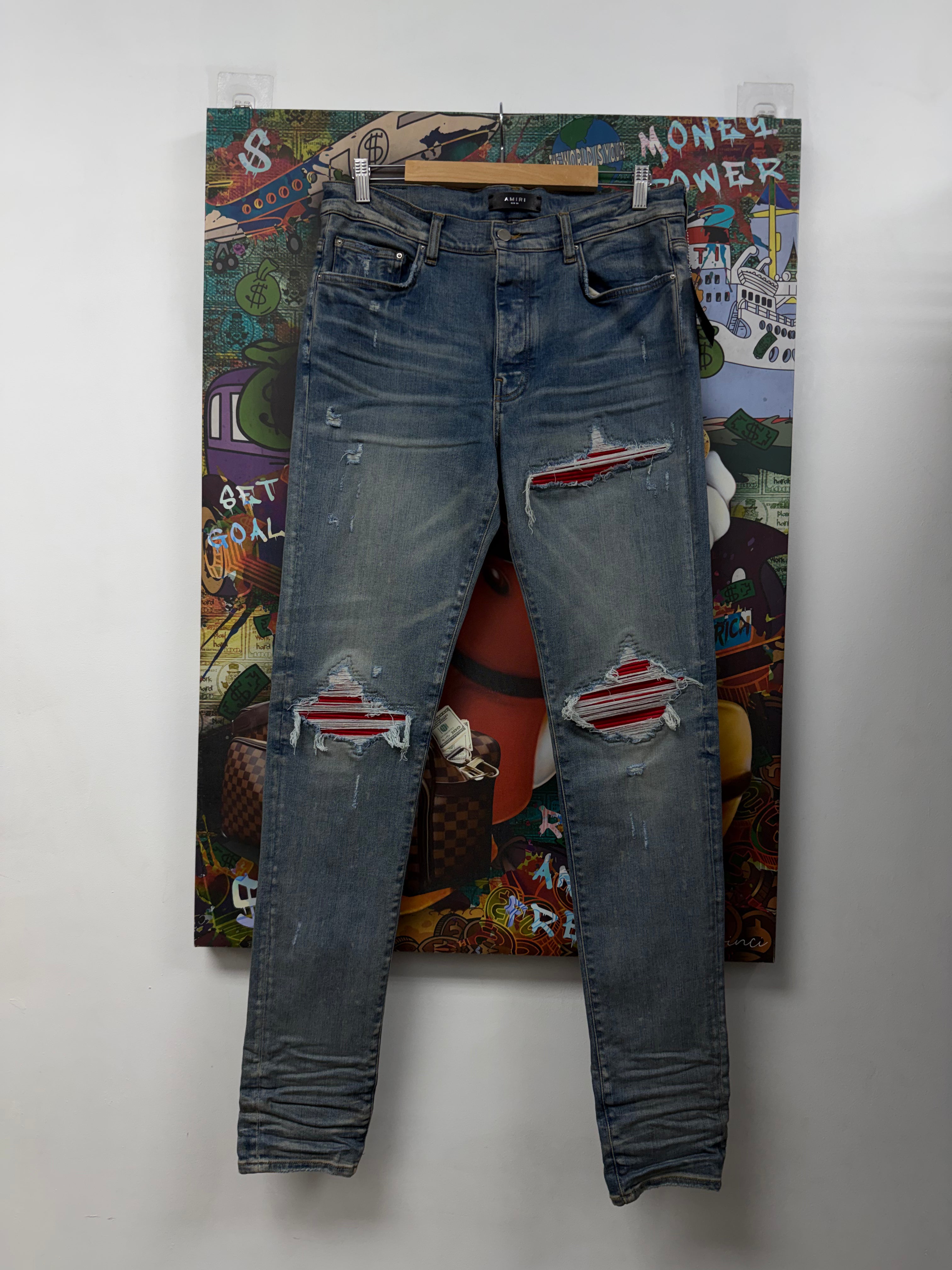 Amiri MX1 Light Wash Red Ultrasuede Patch Jeans