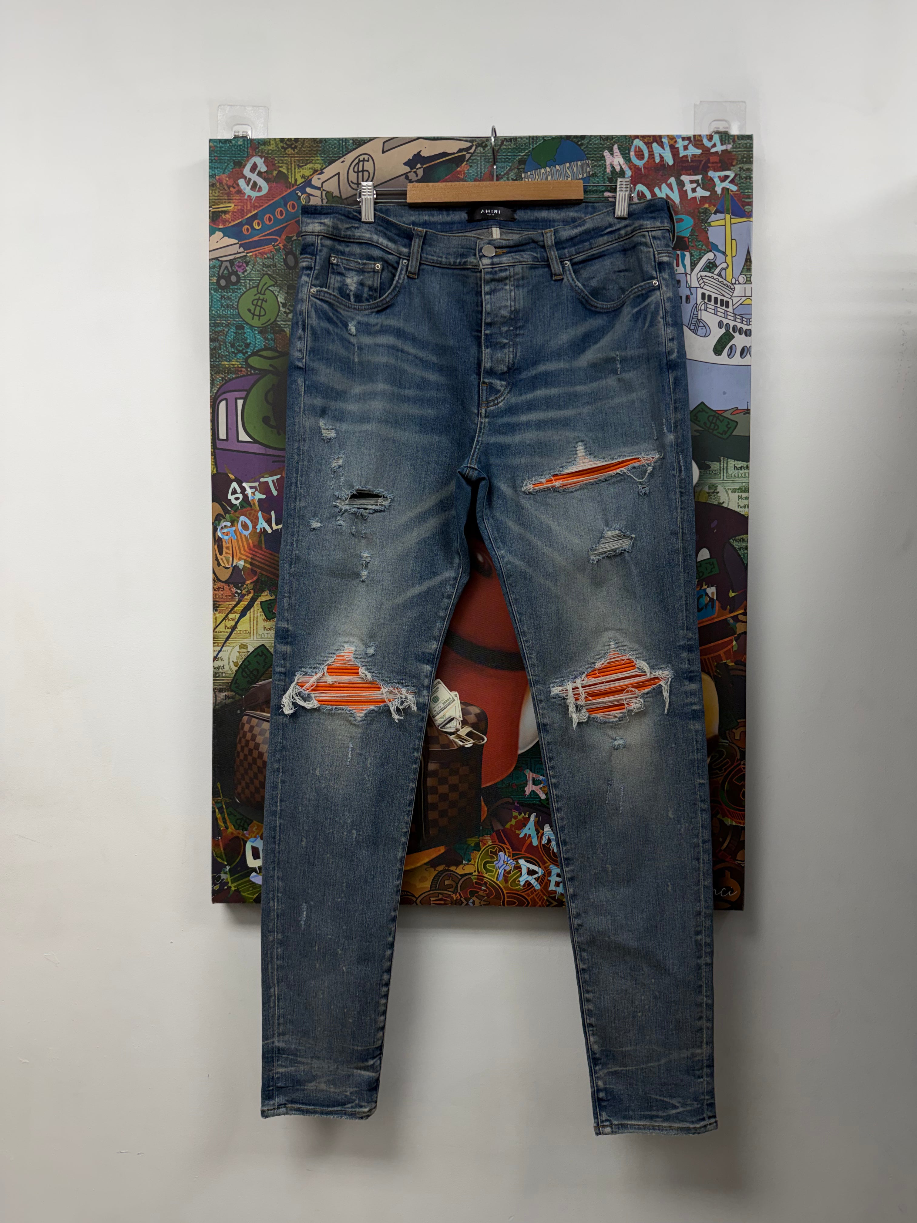 Amiri MX1 Light Wash Orange Ultrasuede Patch Jeans