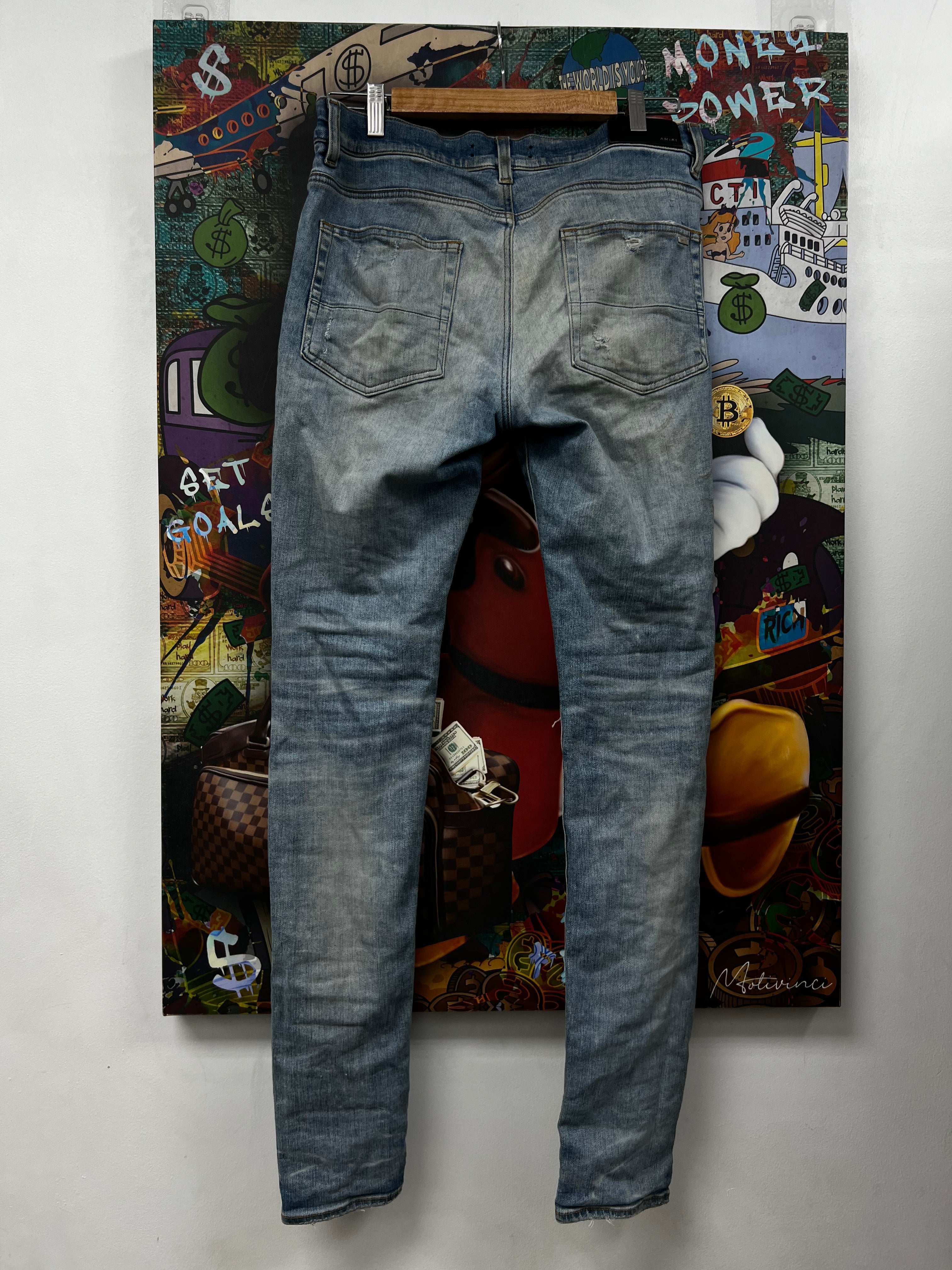 Amiri MX1 Light Wash Orange Crackle Patch Jeans