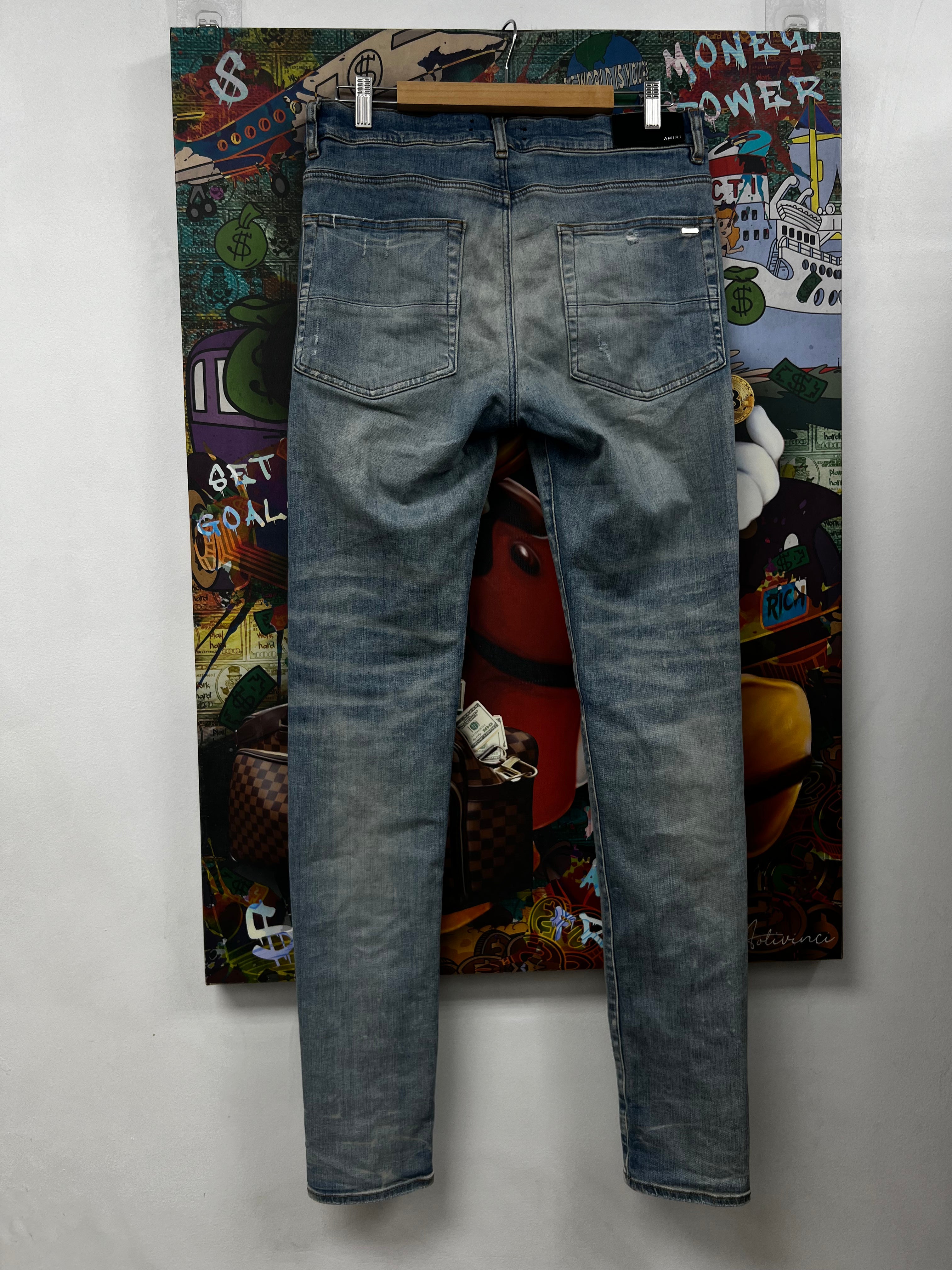 Amiri MX1 Light Wash Pink Patch Jeans
