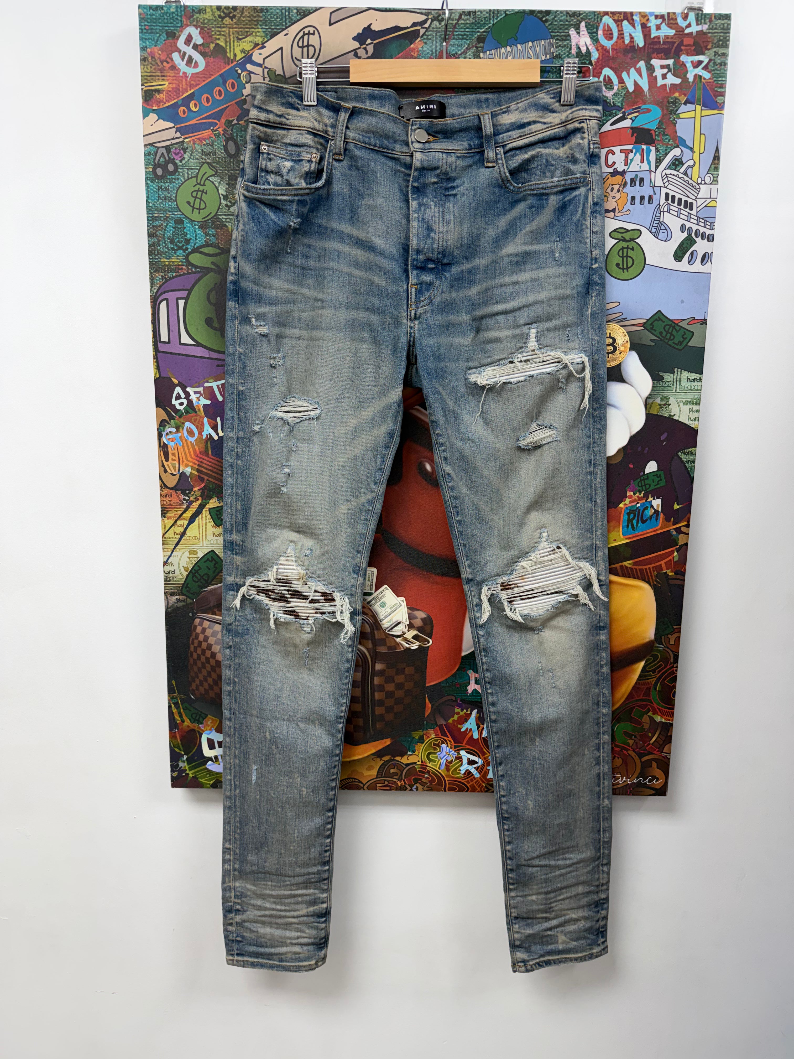 Amiri MX1 Light Wash Marble Patch Jeans