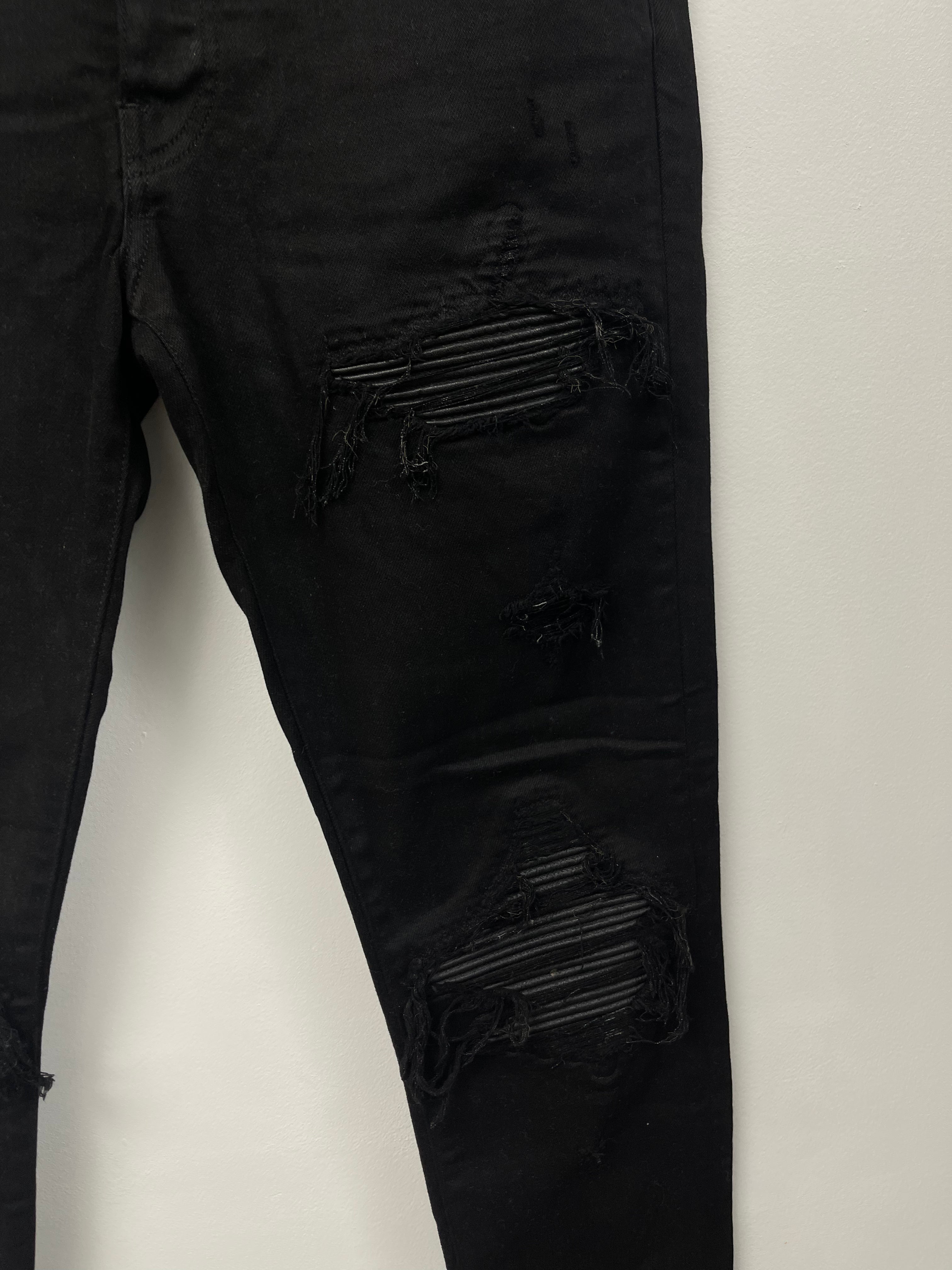 Amiri MX1 Black Leather Patch Jeans