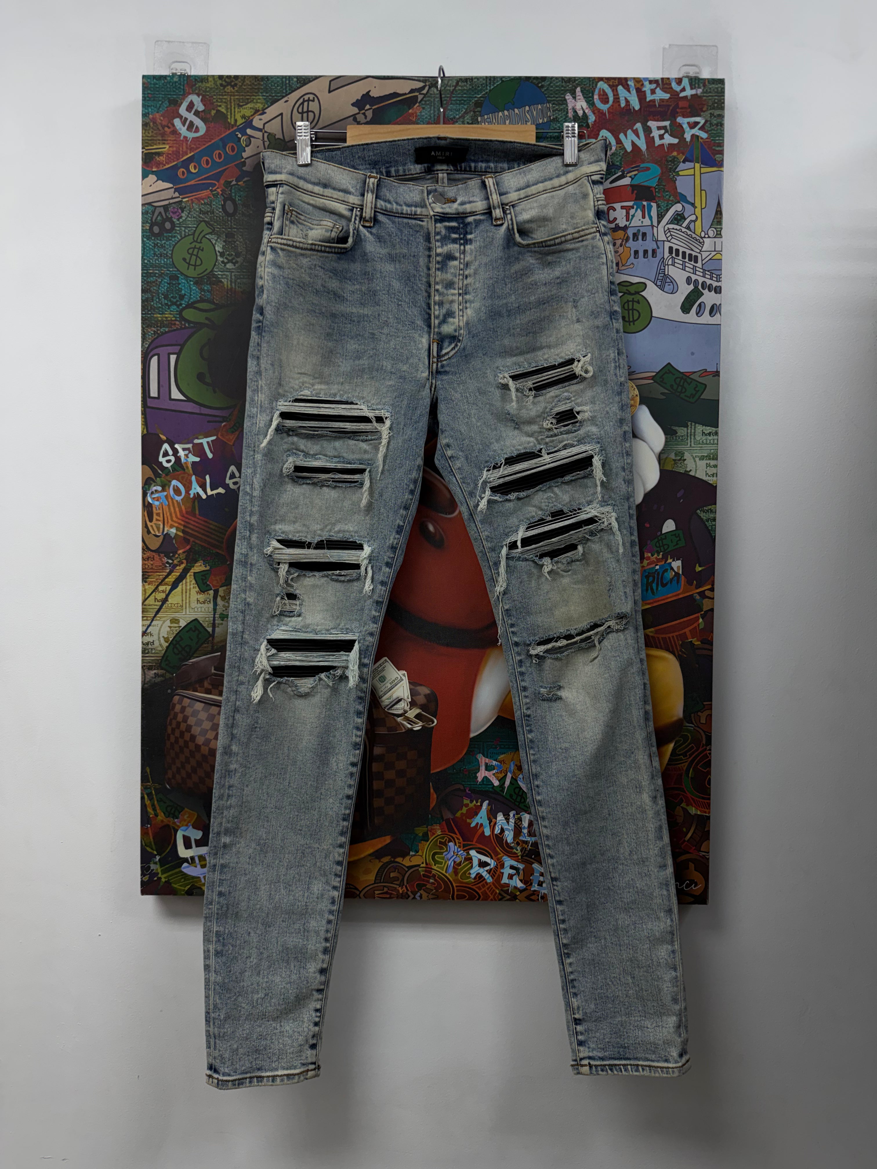 Amiri Stone Wash Black Thrasher Patch Jeans