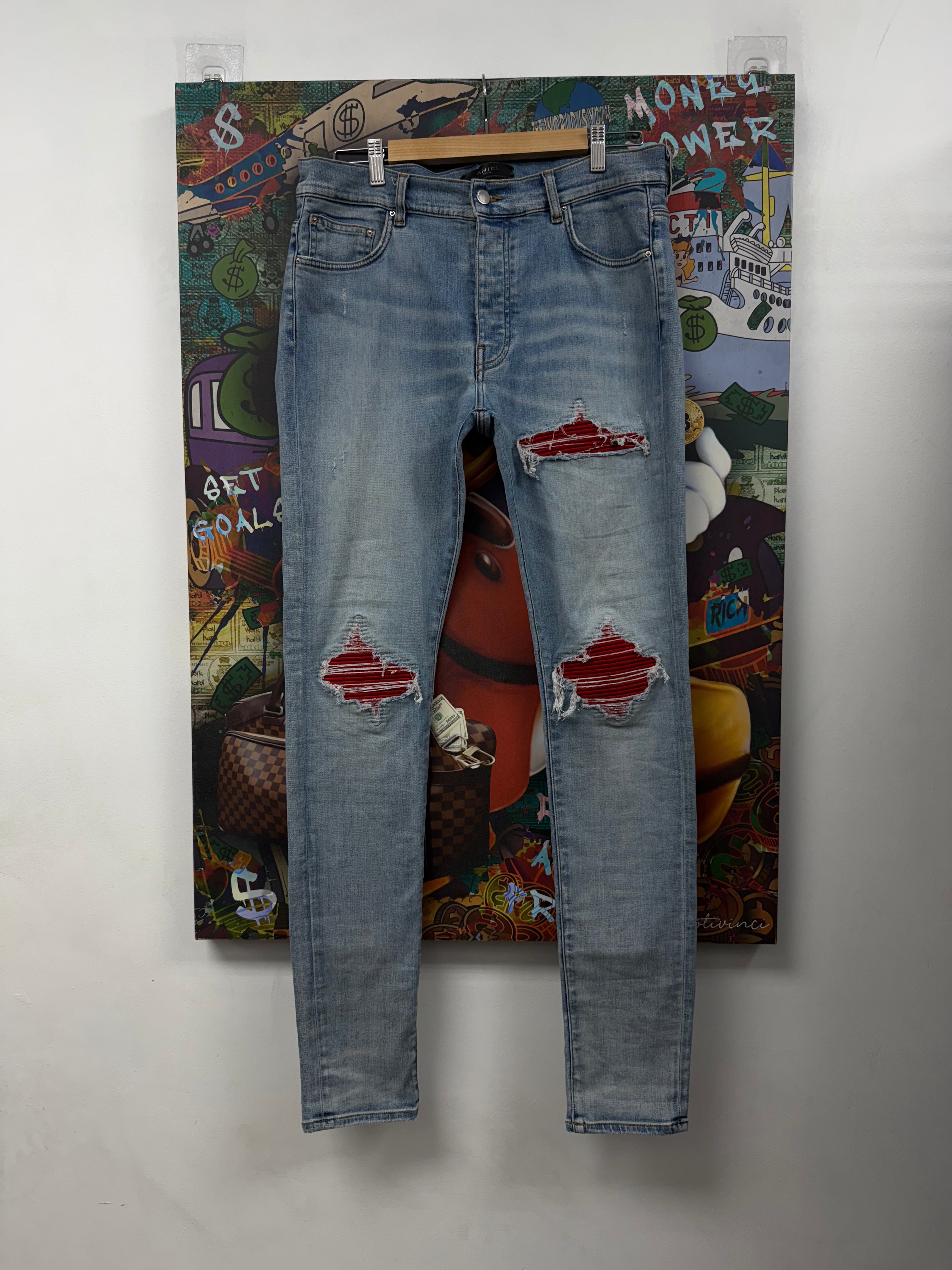 Amiri MX1 Light Wash Red Patch Jeans