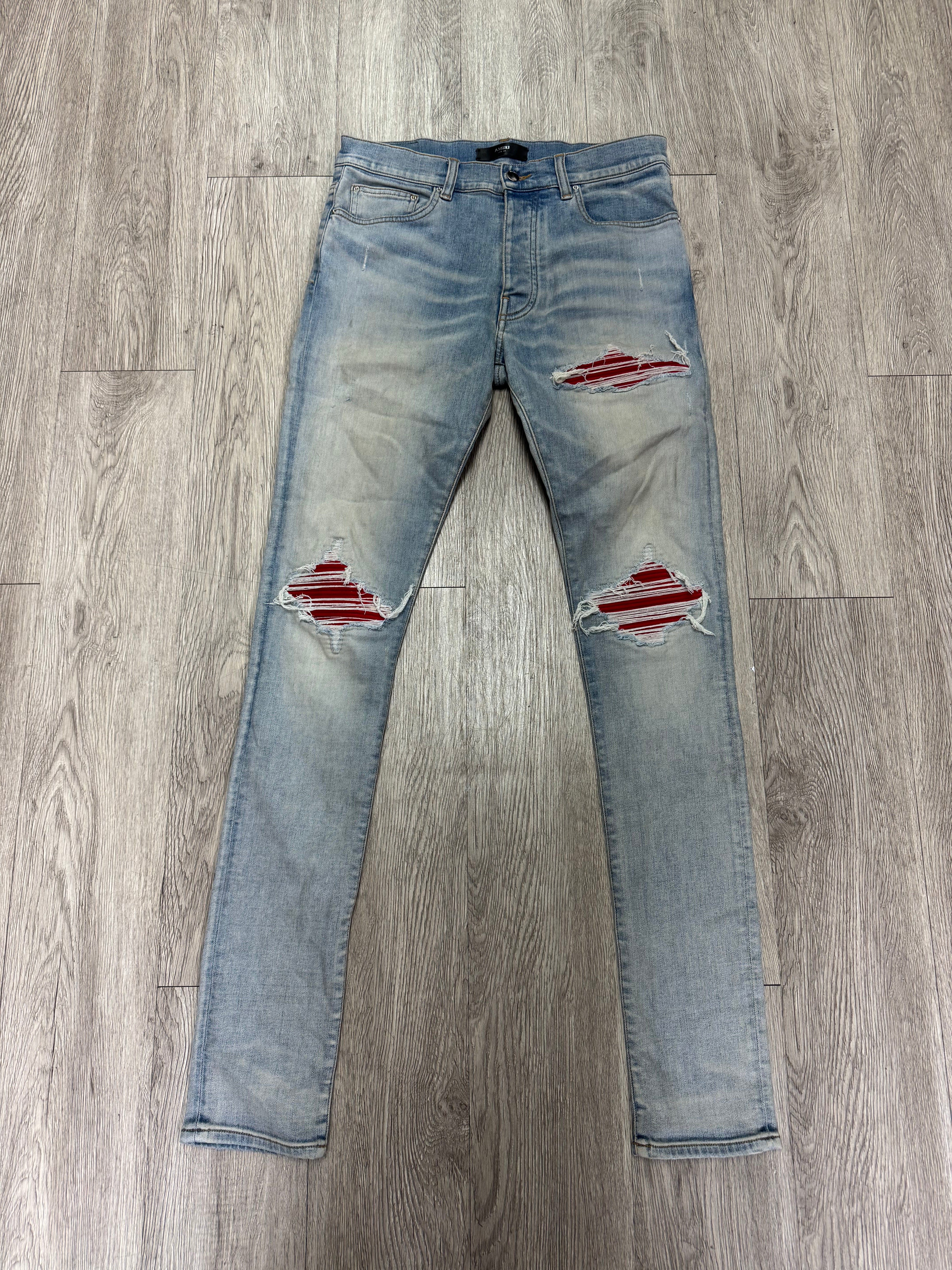 Amiri MX1 Light Wash Red Suede Patch Jeans