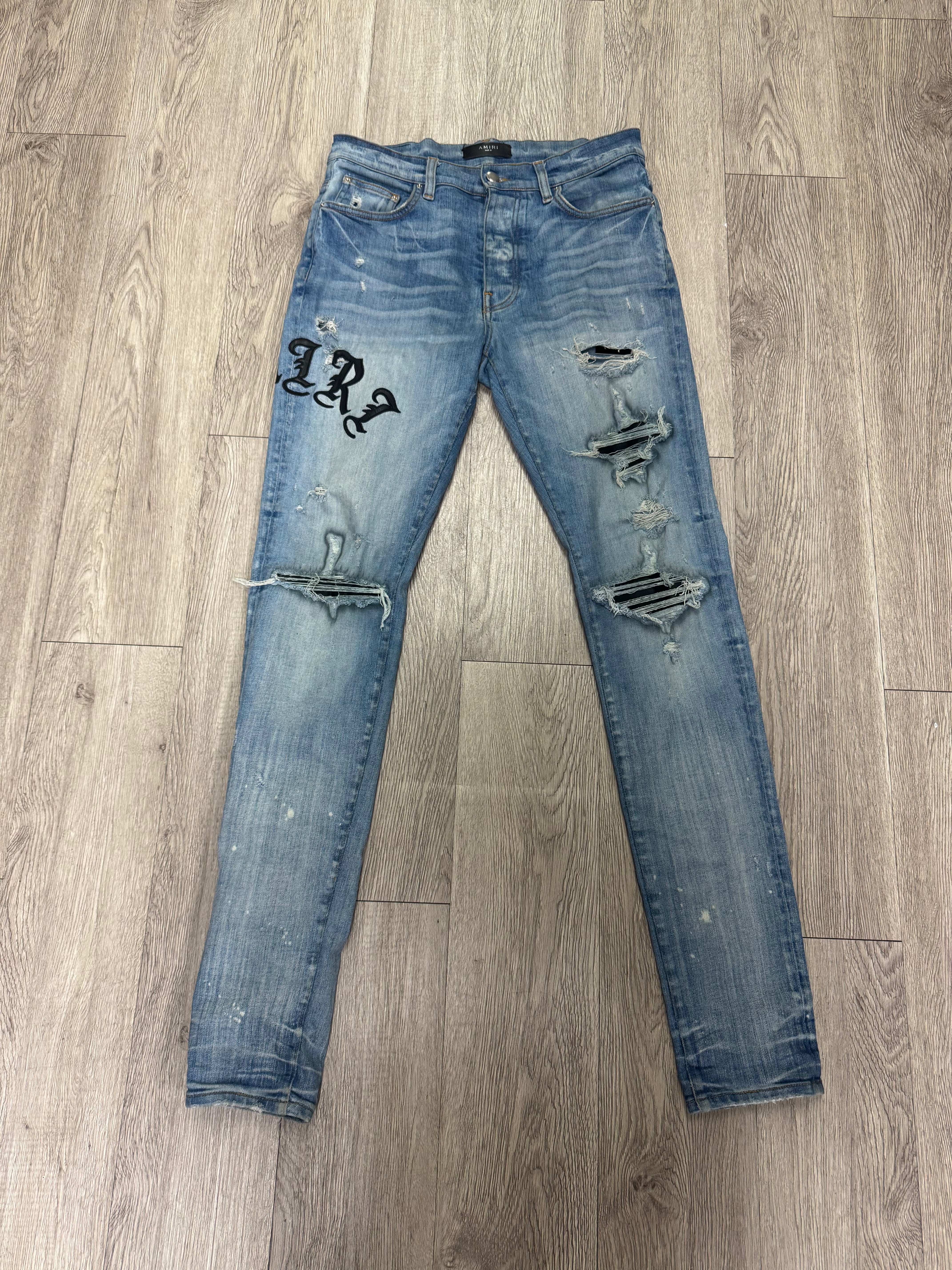 Amiri Light Wash Old English Jeans