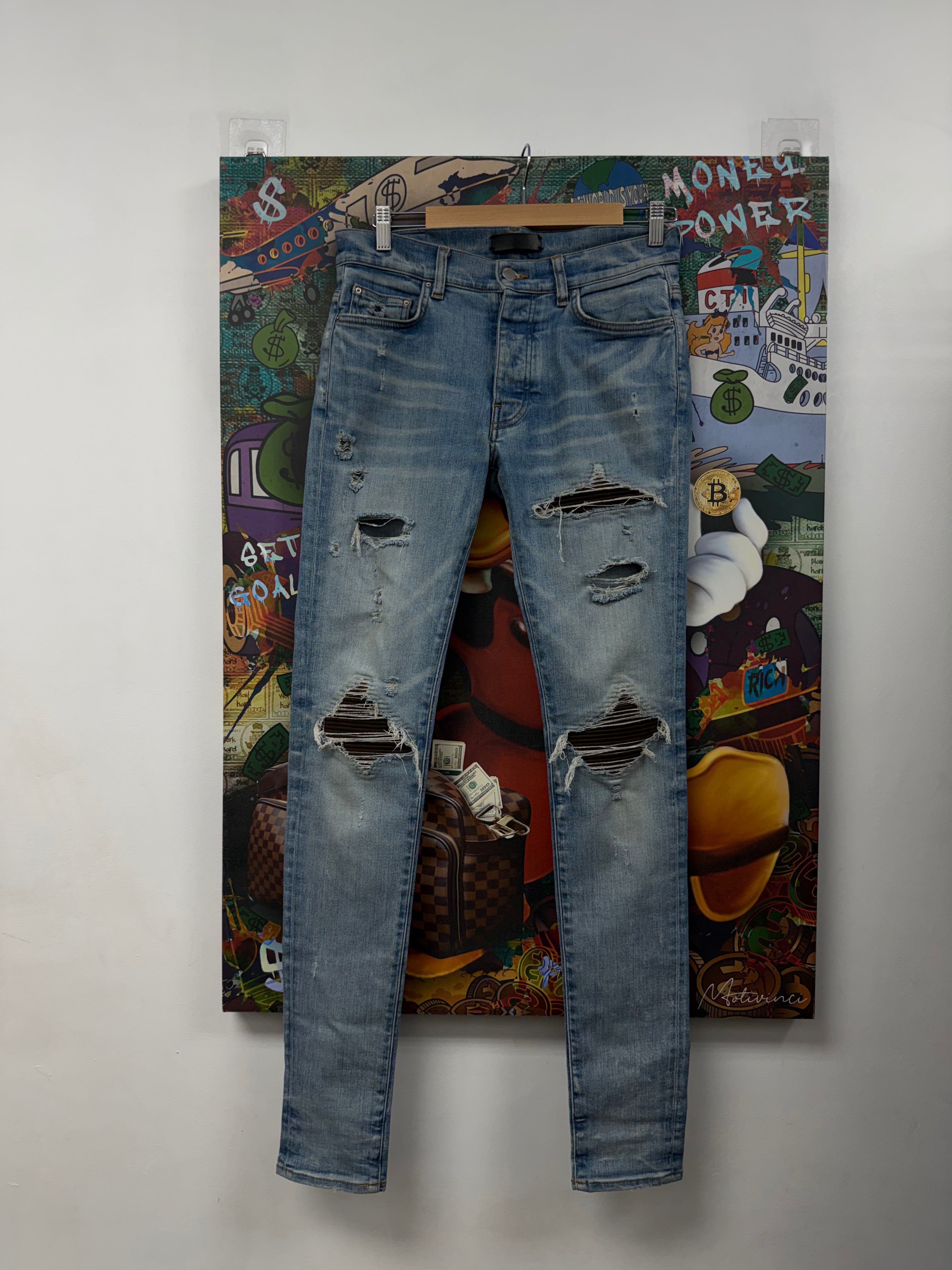 Amiri MX1 Light Wash Brown Patch Jeans
