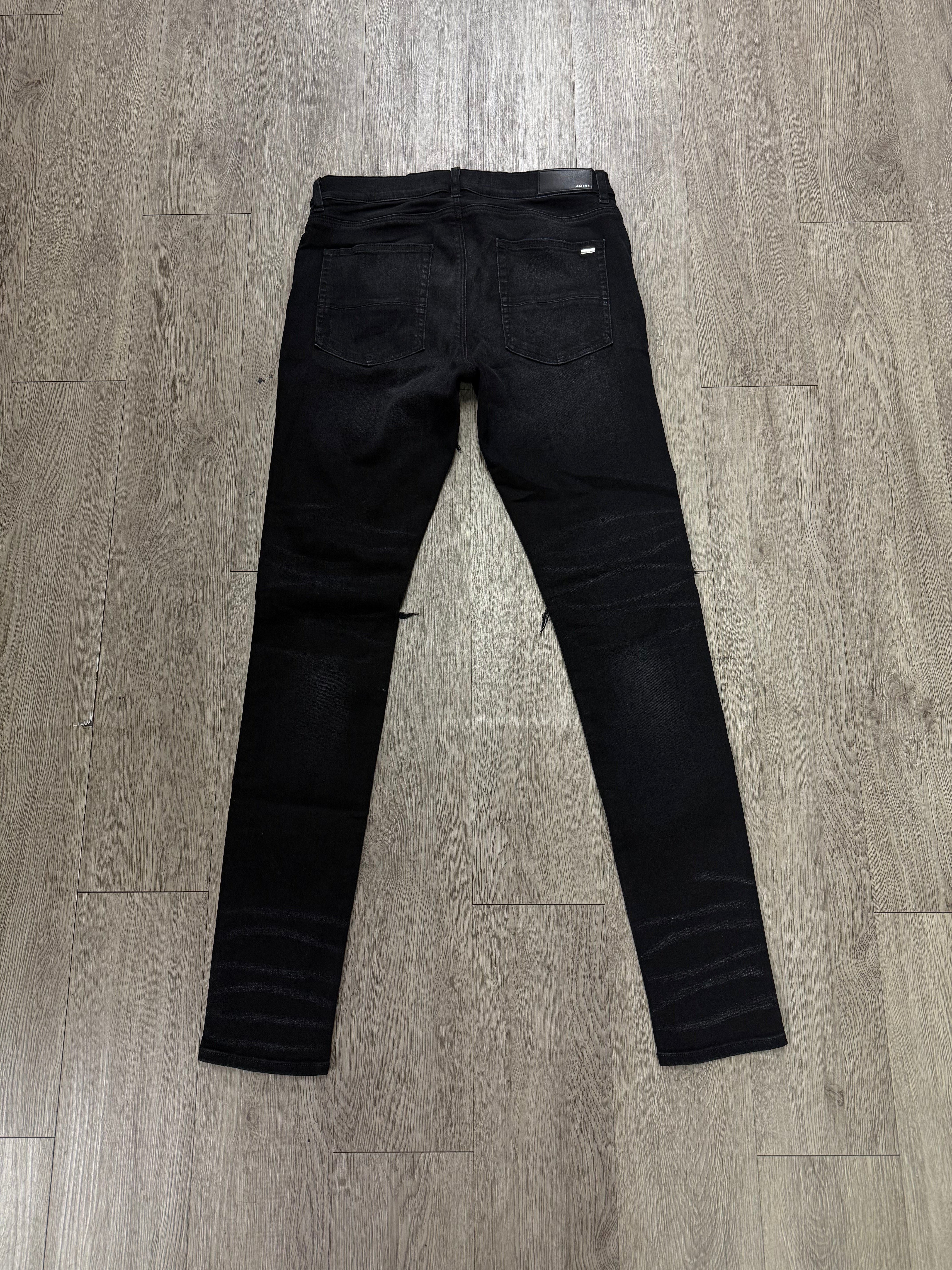 Amiri MX1 Black Wash Marble Patch Jeans