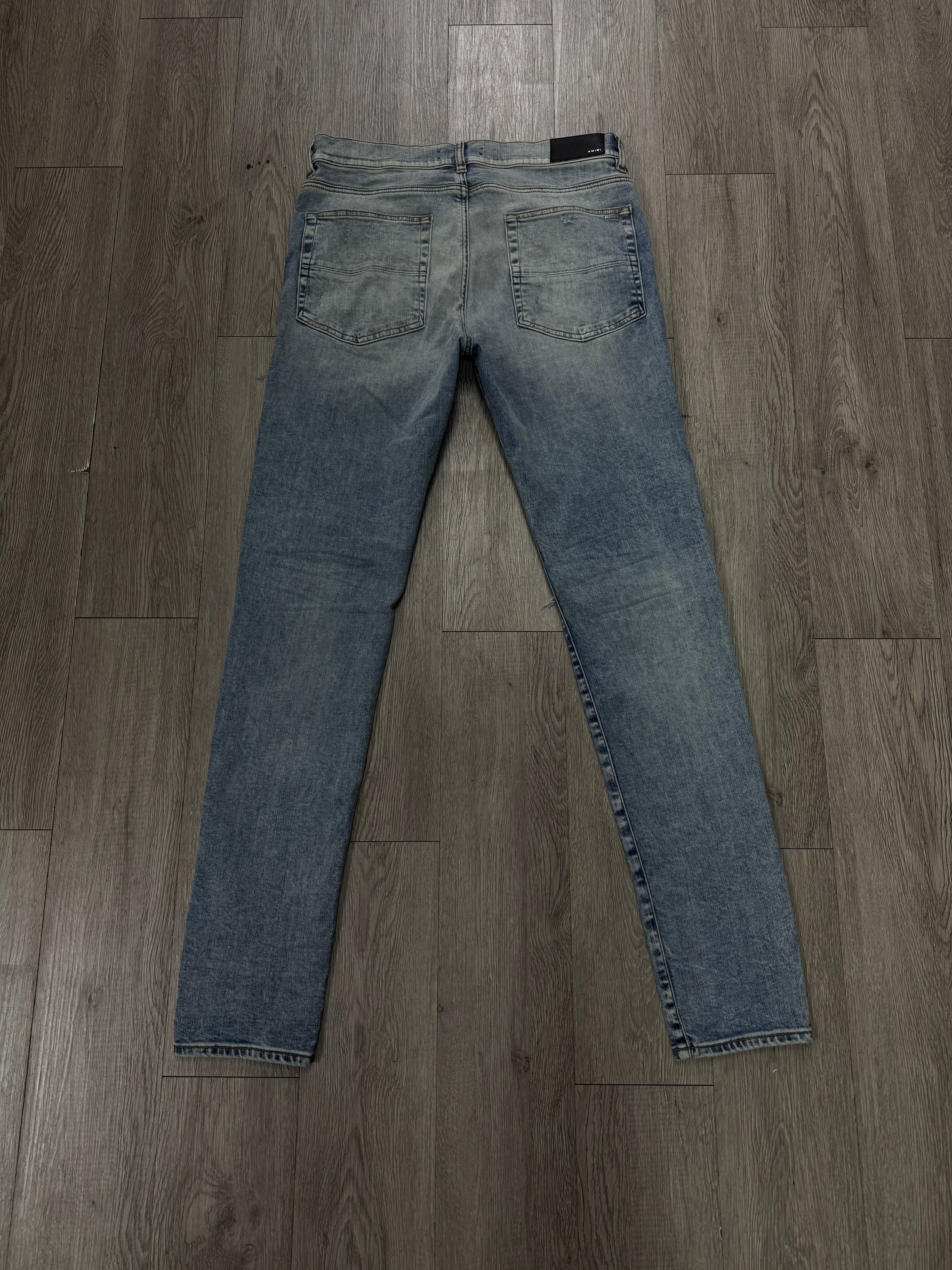 Amiri MX1 Light Wash Aqua Patch Jeans