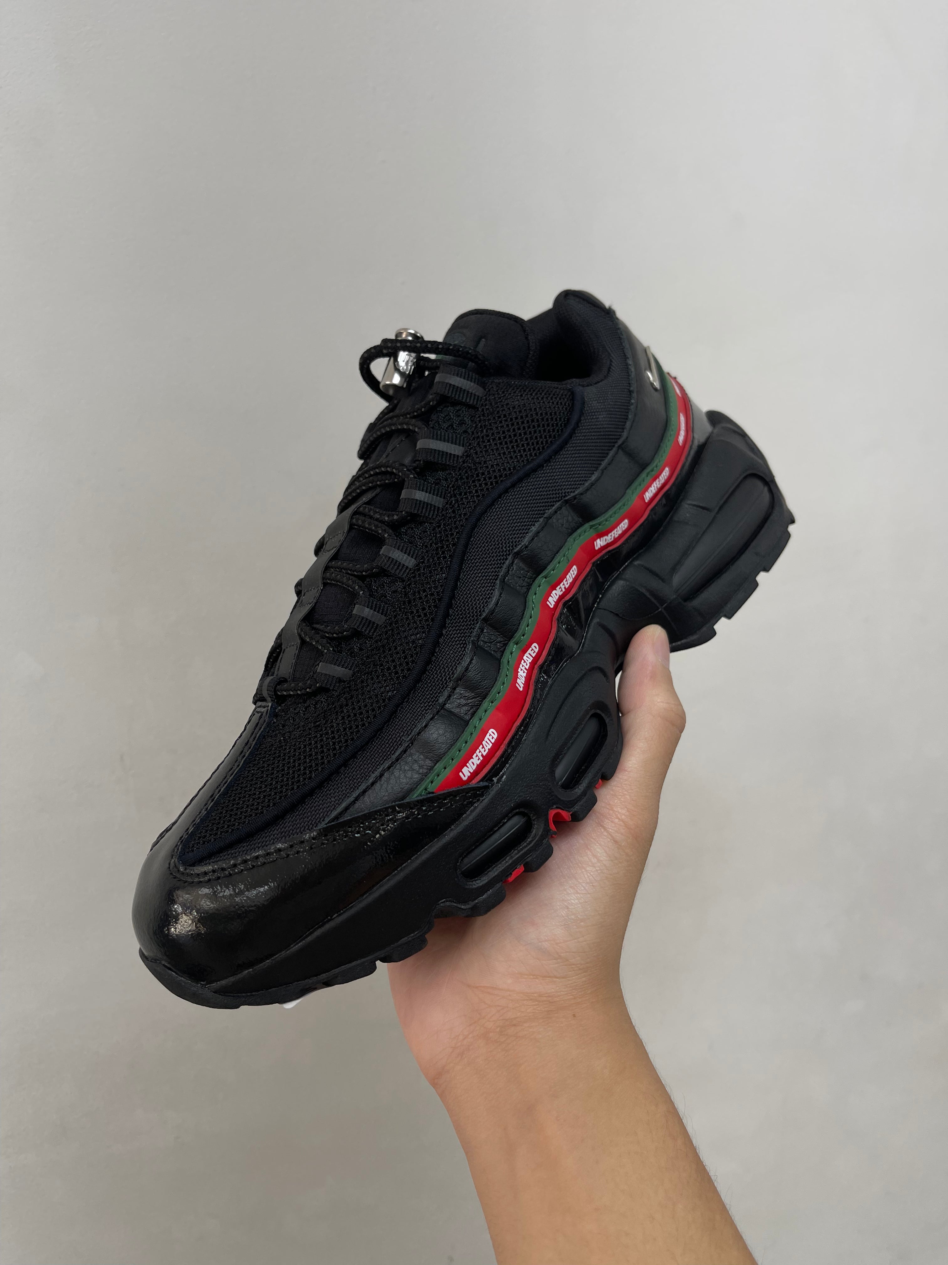 Nike AM95 Undefeated Sneakers