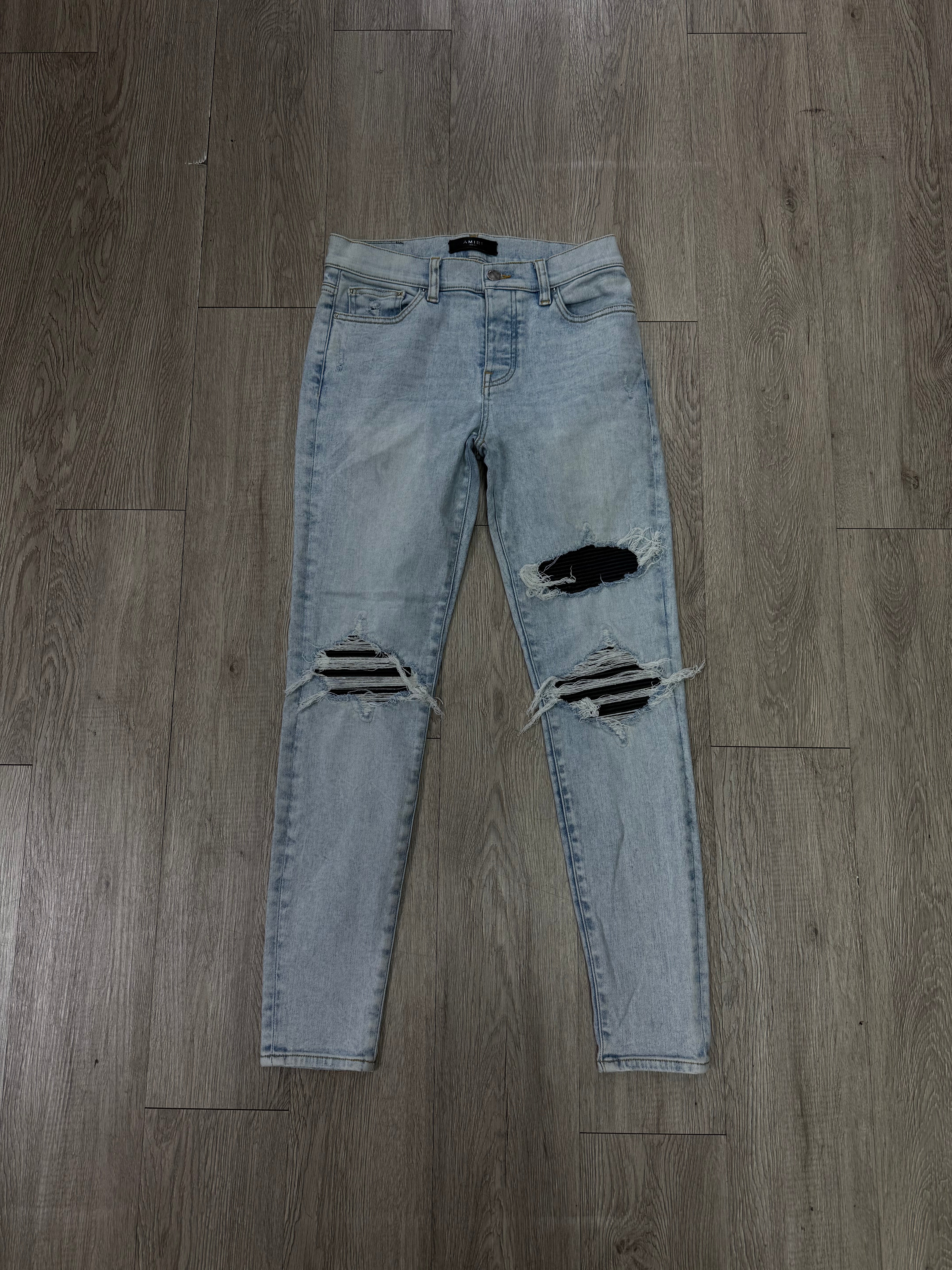 Amiri MX1 Light Wash Black Leather Patch (Women's) Jeans
