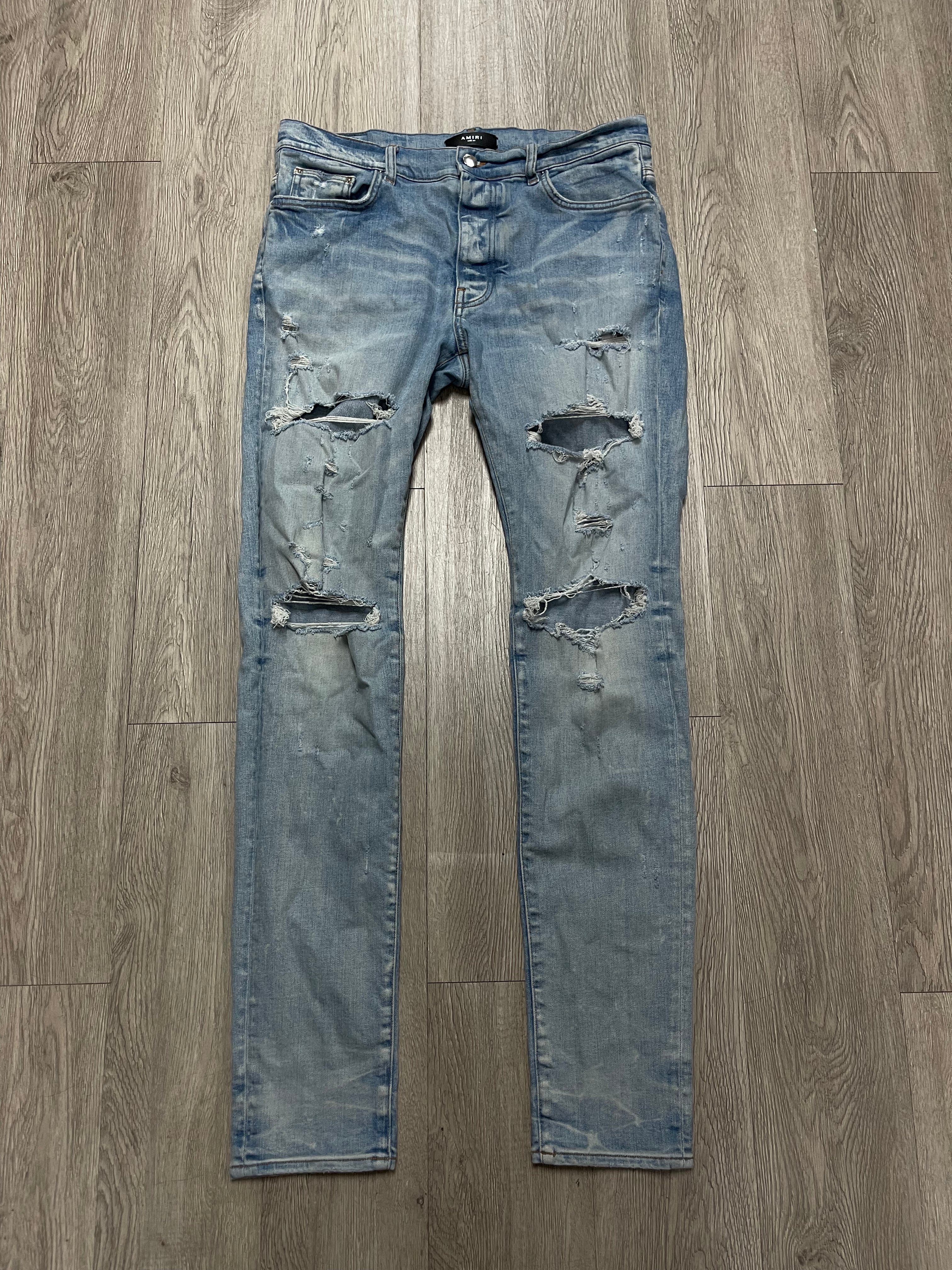 Amiri Light Wash Plain Thrasher Ripped Jeans