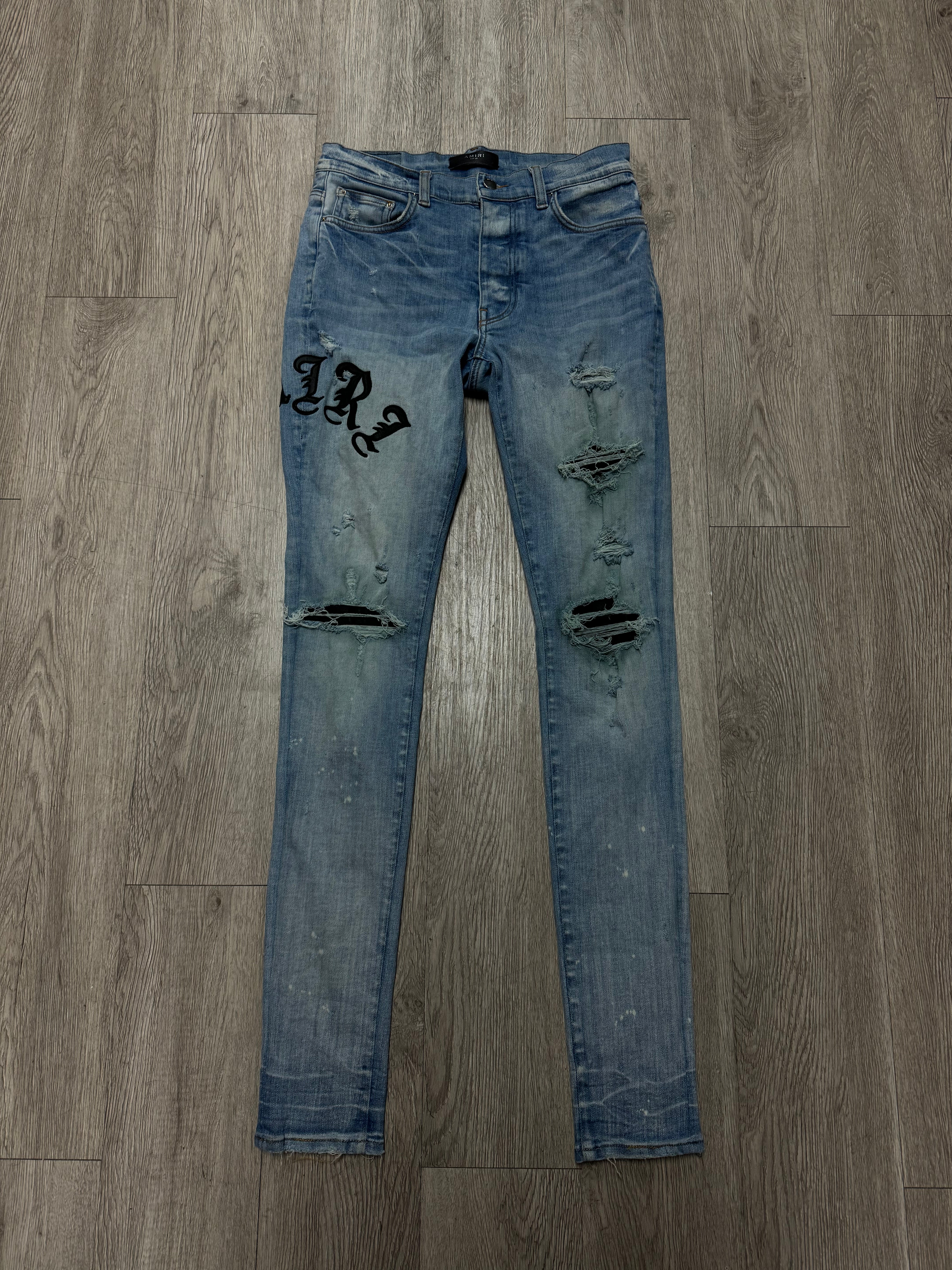 Amiri Light Wash Old English Jeans