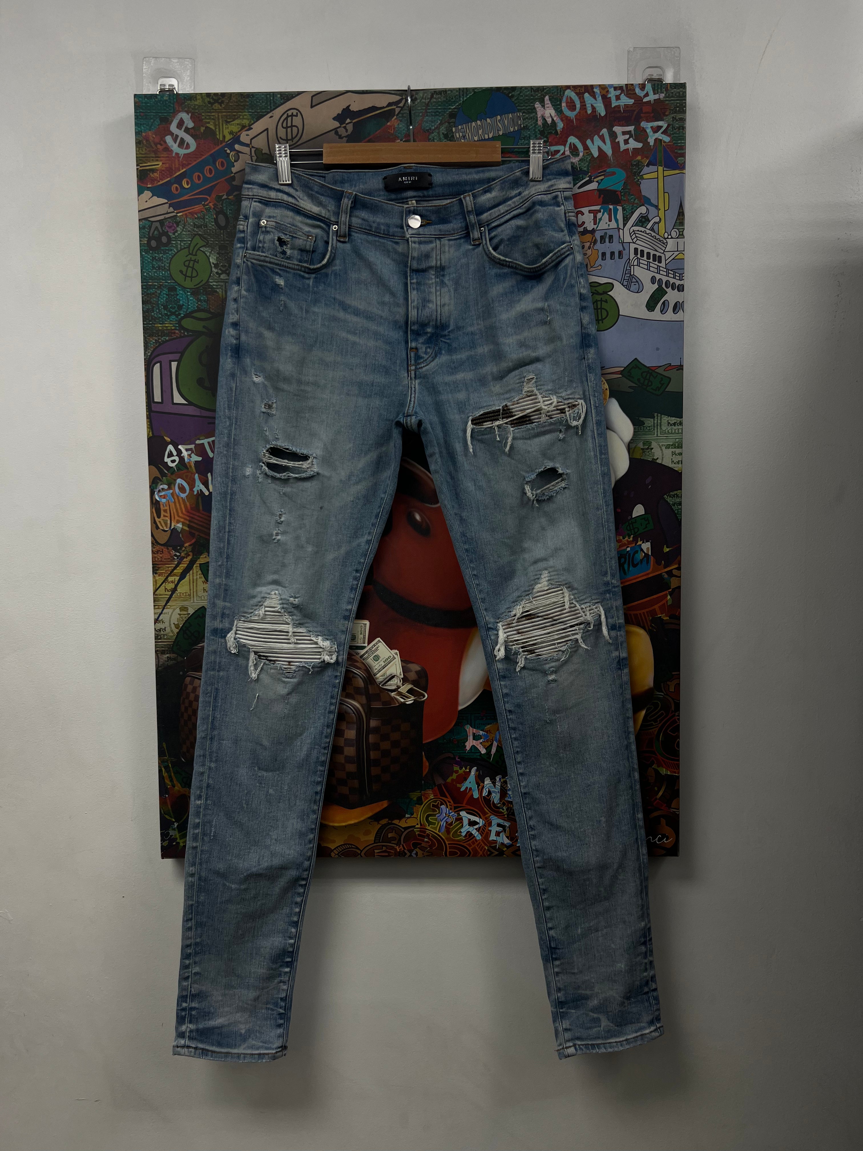 Amiri MX1 Light Wash Marble Patch Jeans