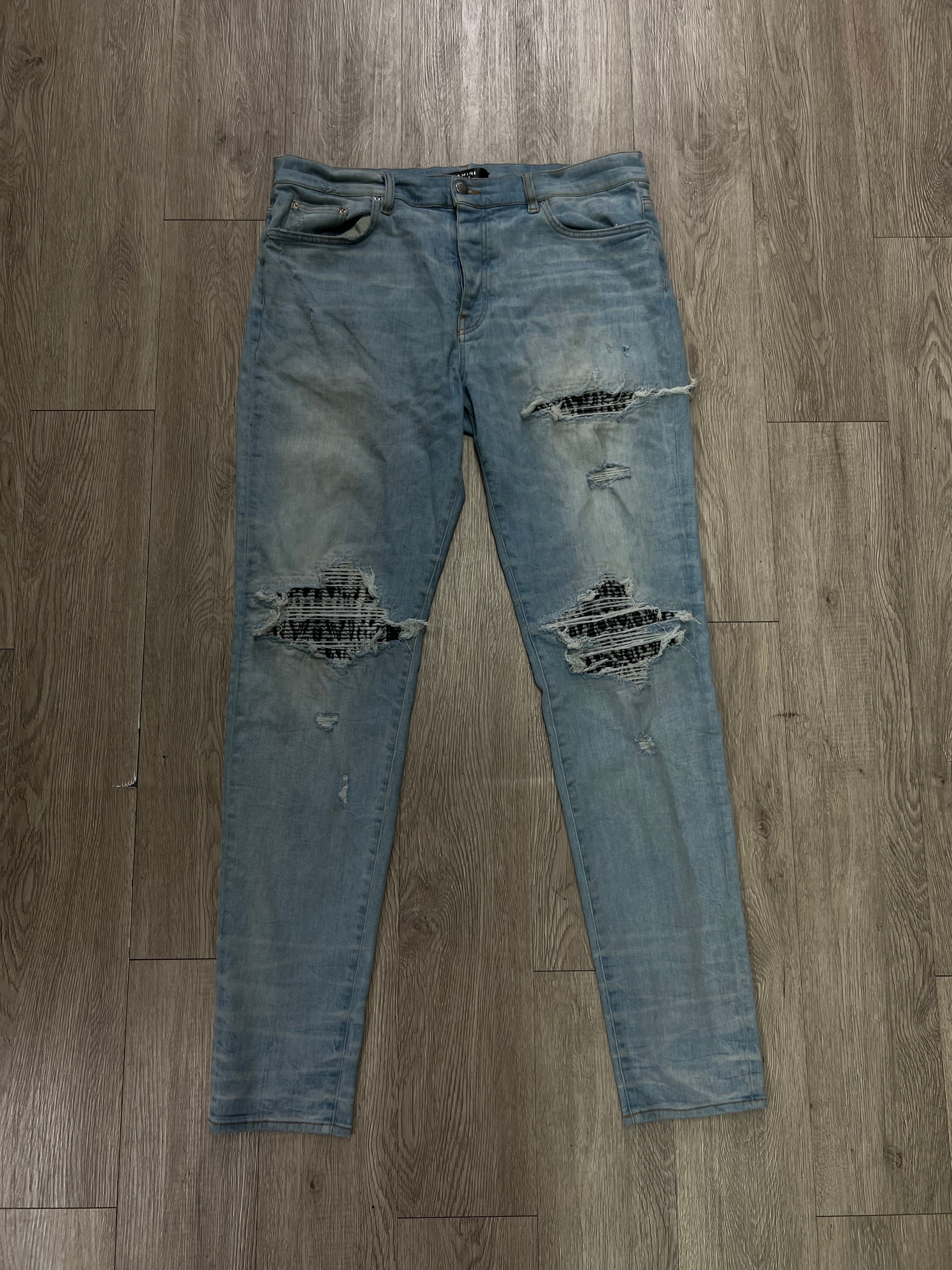 Amiri MX1 Light Wash Black White Cheetah Patch Jeans