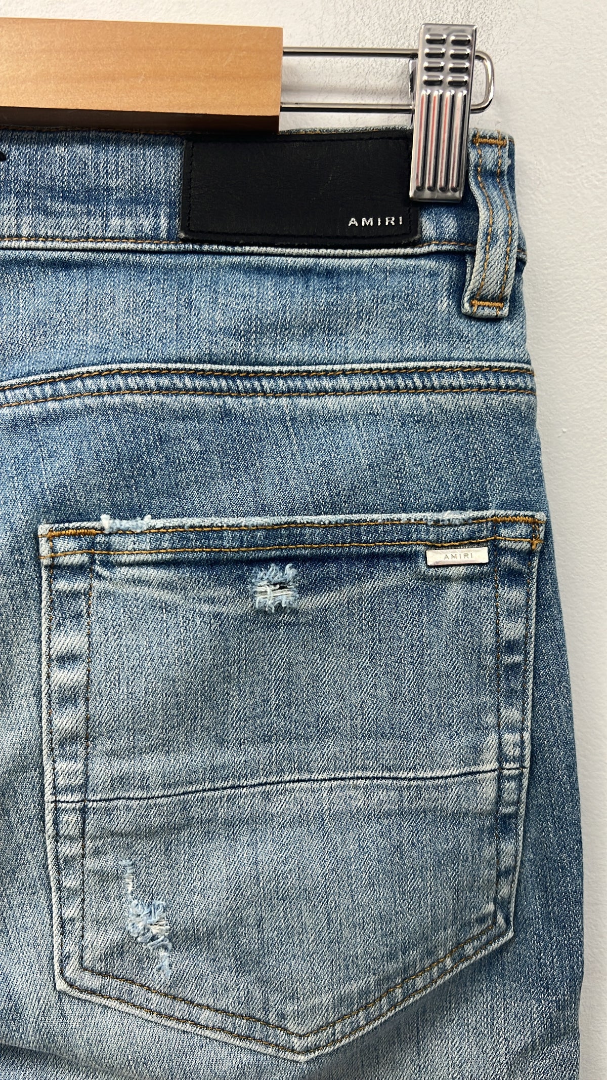 Amiri Light Wash Rainbow Thrasher Patch Jeans