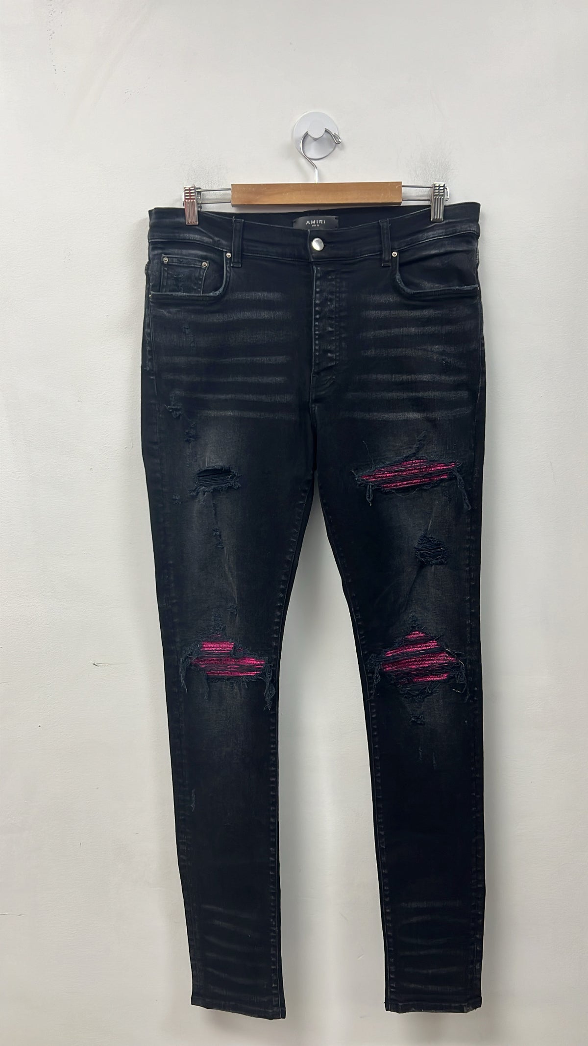 Amiri MX1 Black Wash Pink Crackle Jeans