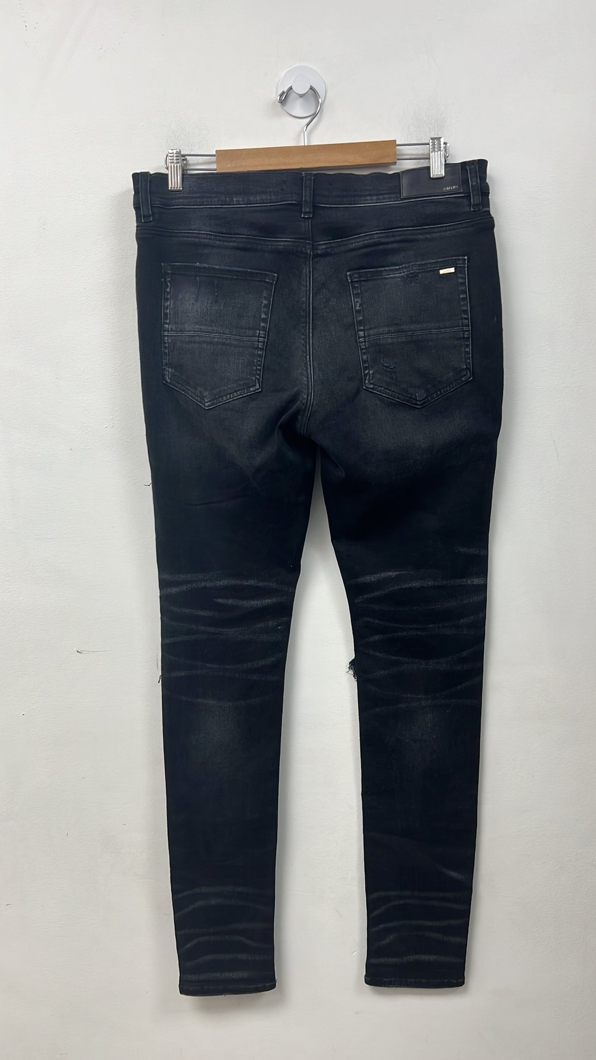 Amiri MX1 Black Wash Pink Crackle Jeans